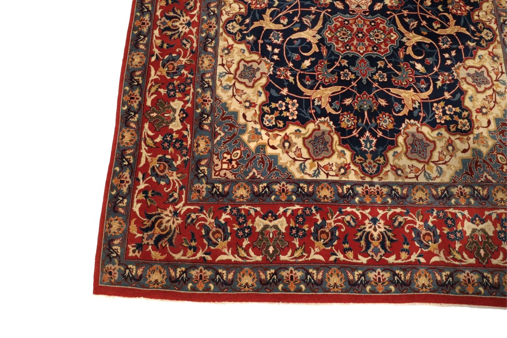 Embrace the epitome of refinement with the finely knotted Isfahan rug, a masterpiece of artistry and craftsmanship that will bestow unparalleled grace upon your living space. This rug is more than just a floor covering; it's an enduring testament to