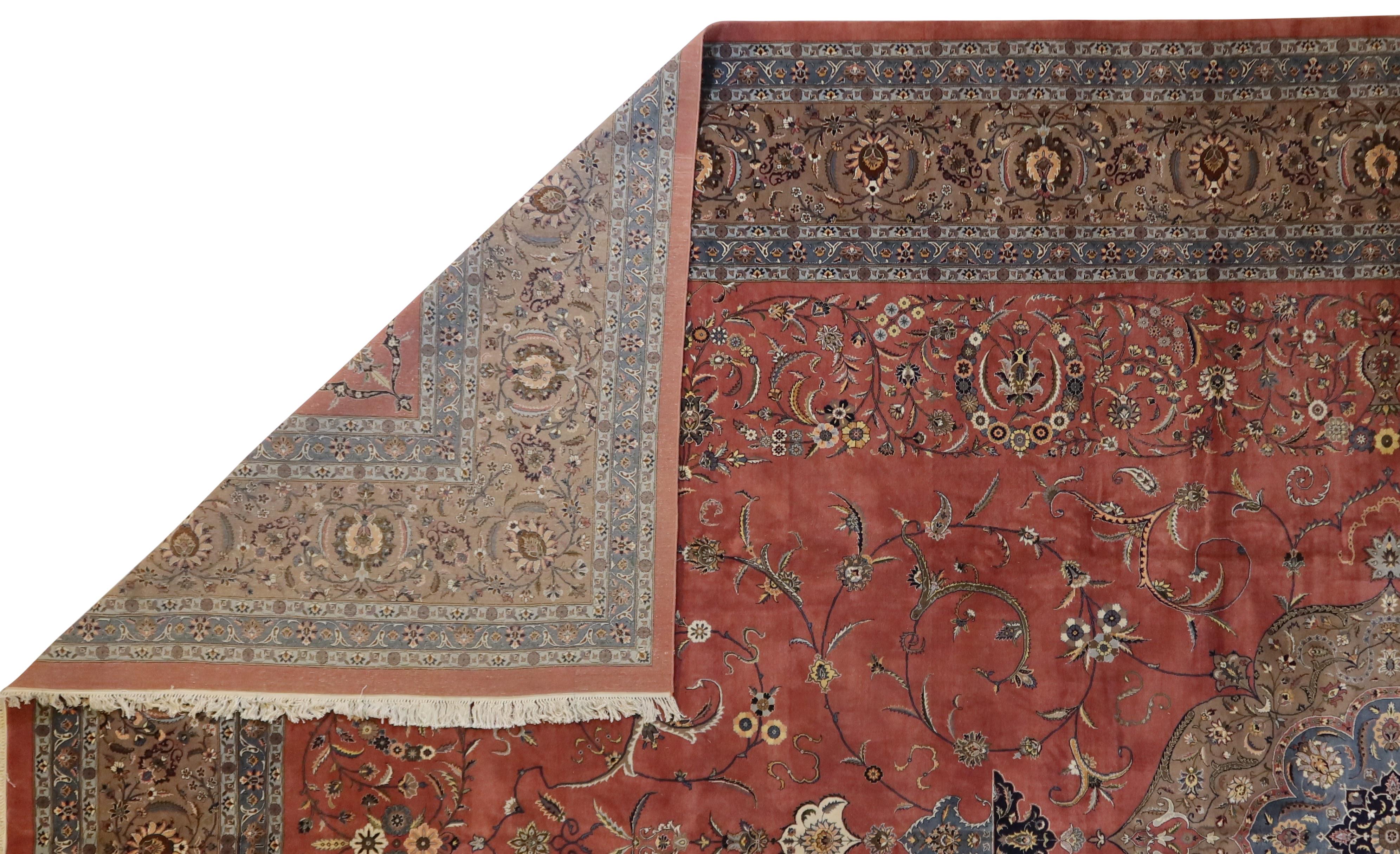 This fine quality, new production Esfahan rug is a reproduction of the historic Persian rugs. High quality New Zealand yarn is finely hand-knotted to create these luxury rugs that are unusually high performance. The rugs are offered in standard