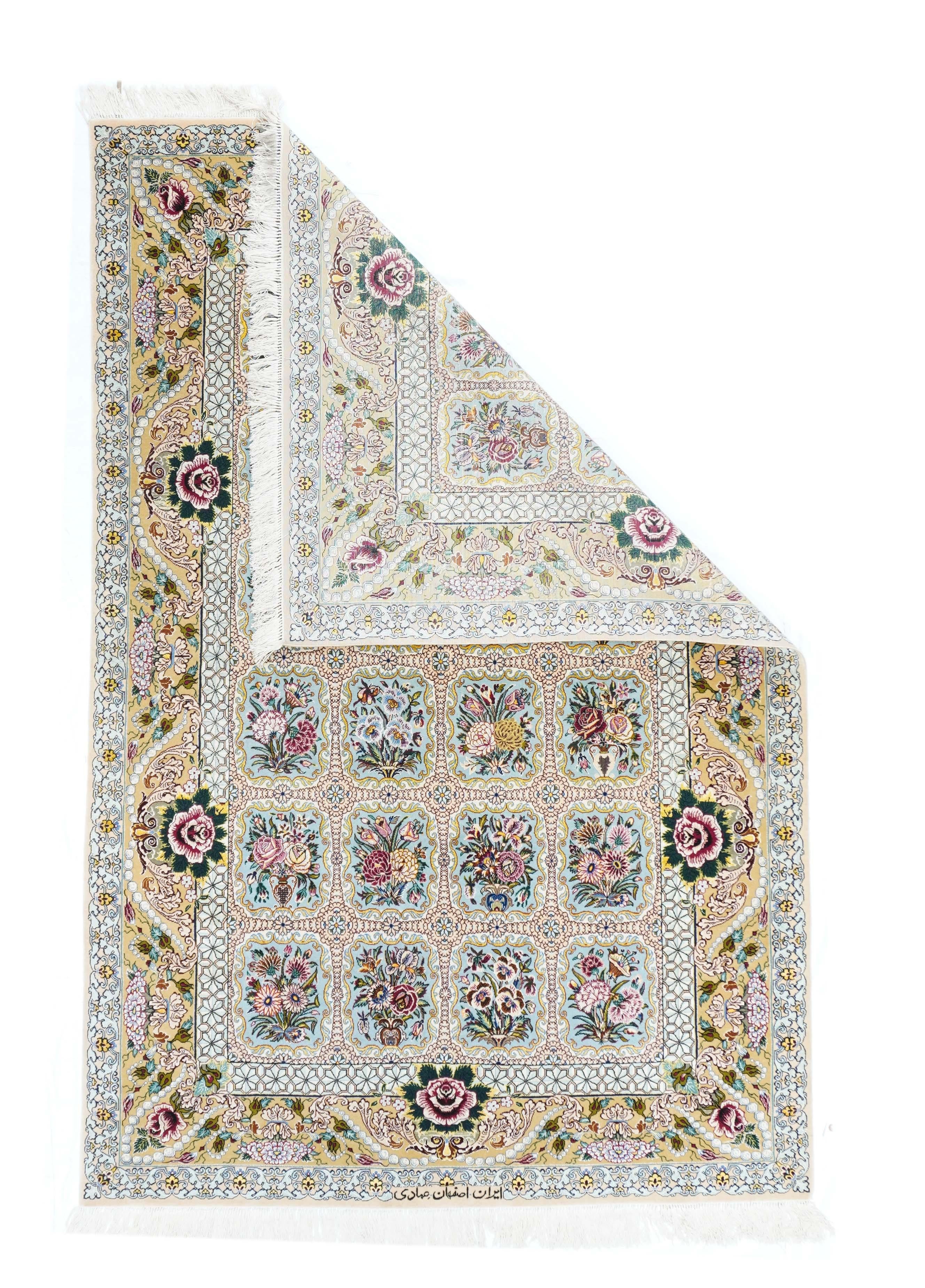 This recent finely woven scatter shows an unusual allover square four by six gridwork on an ecru field with various rose-driven bouquets in each reserve. Giant dark red cabbage roses in the straw border insouciantly violate the inner border. 