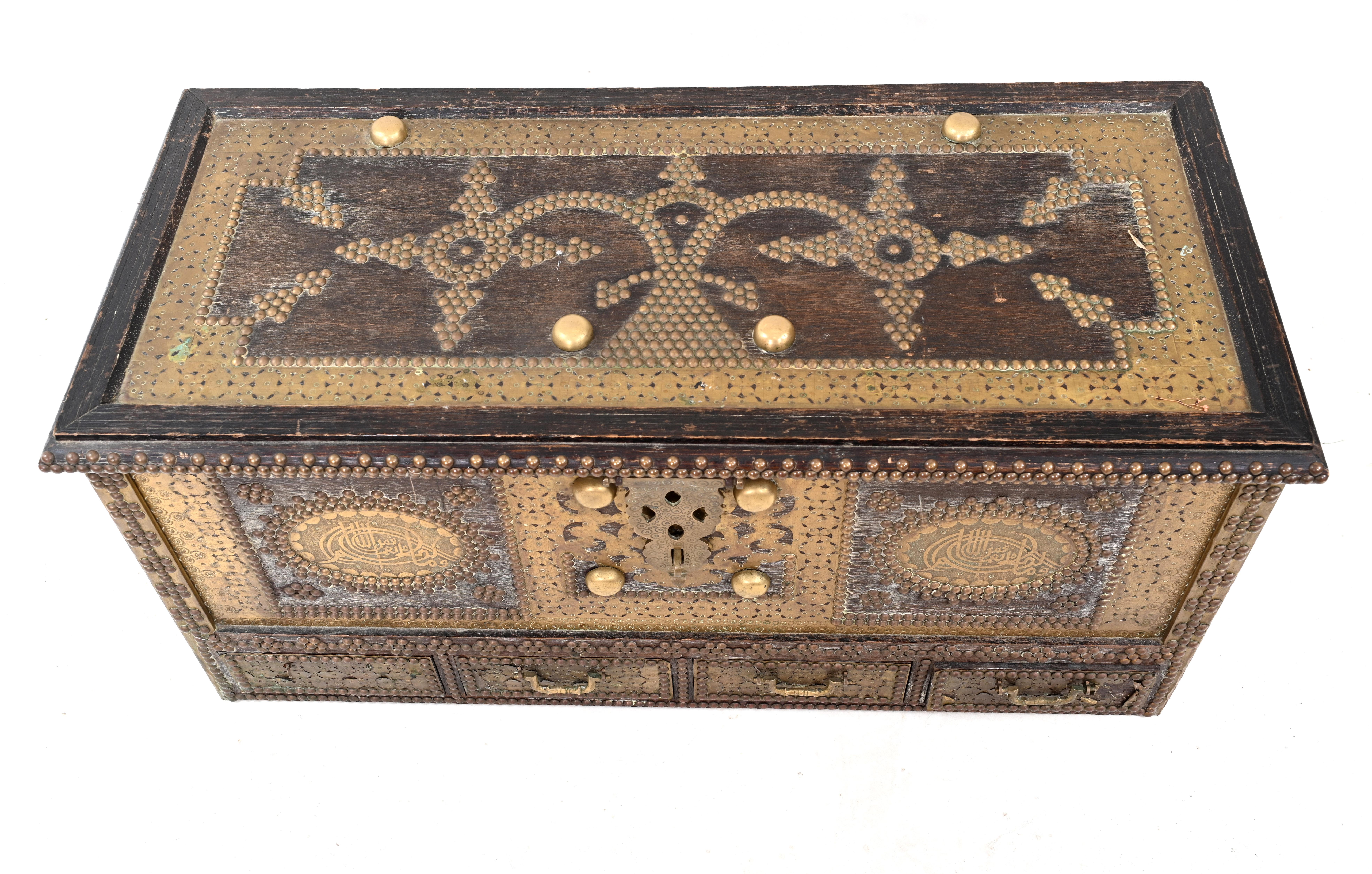 
Unique Islamic dowry chest 
Profusely decorated with brassware and other metal. 
Depicting prayers/blessings on the front. 
We date this important and collectable piece to circa 1820
Very bohemian chic interiors
Some of our items are in