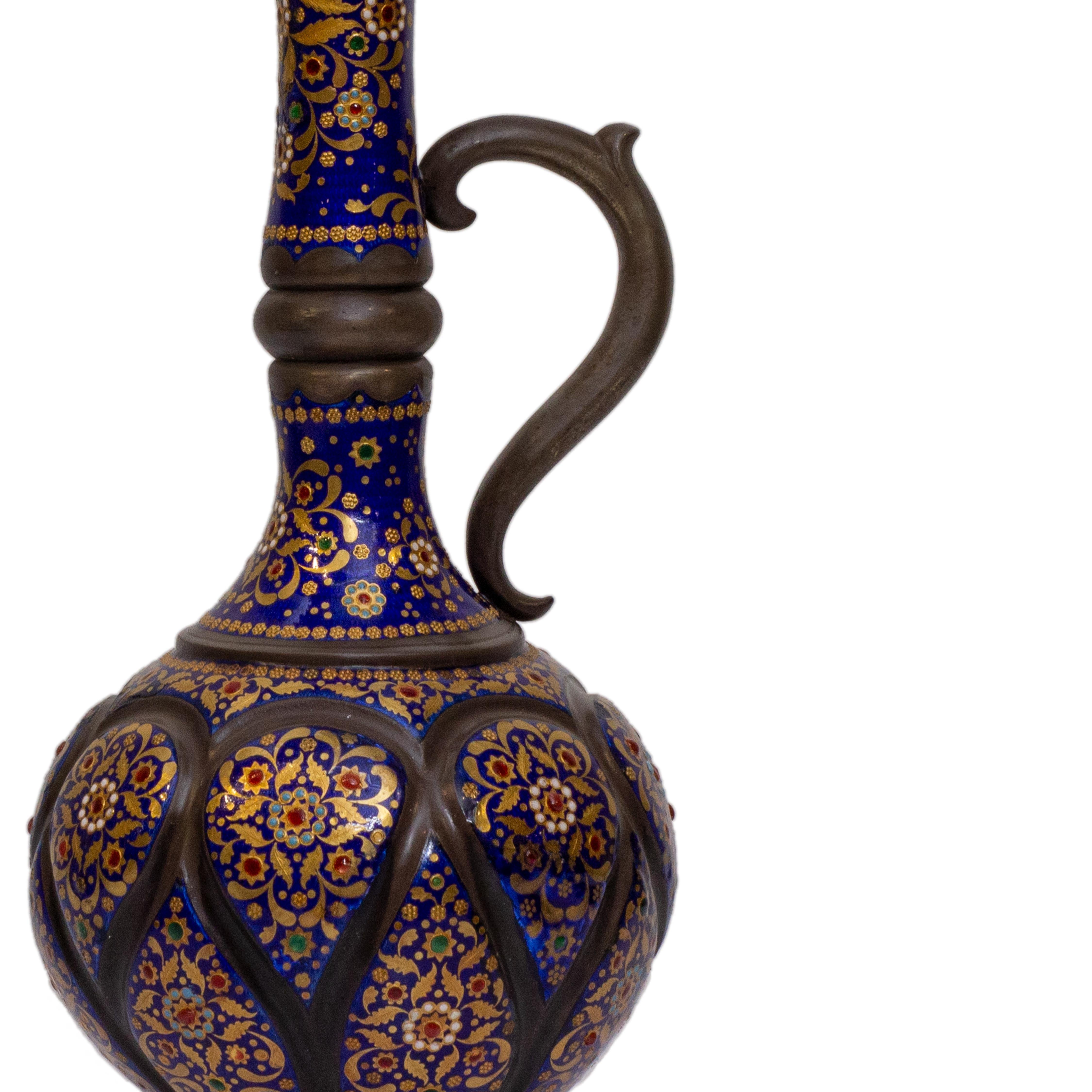 Islamic market enameled silver ewer, circa second half of 19th century. Beautifully enameled on high grade hand hammered silver. Measure: 11.25