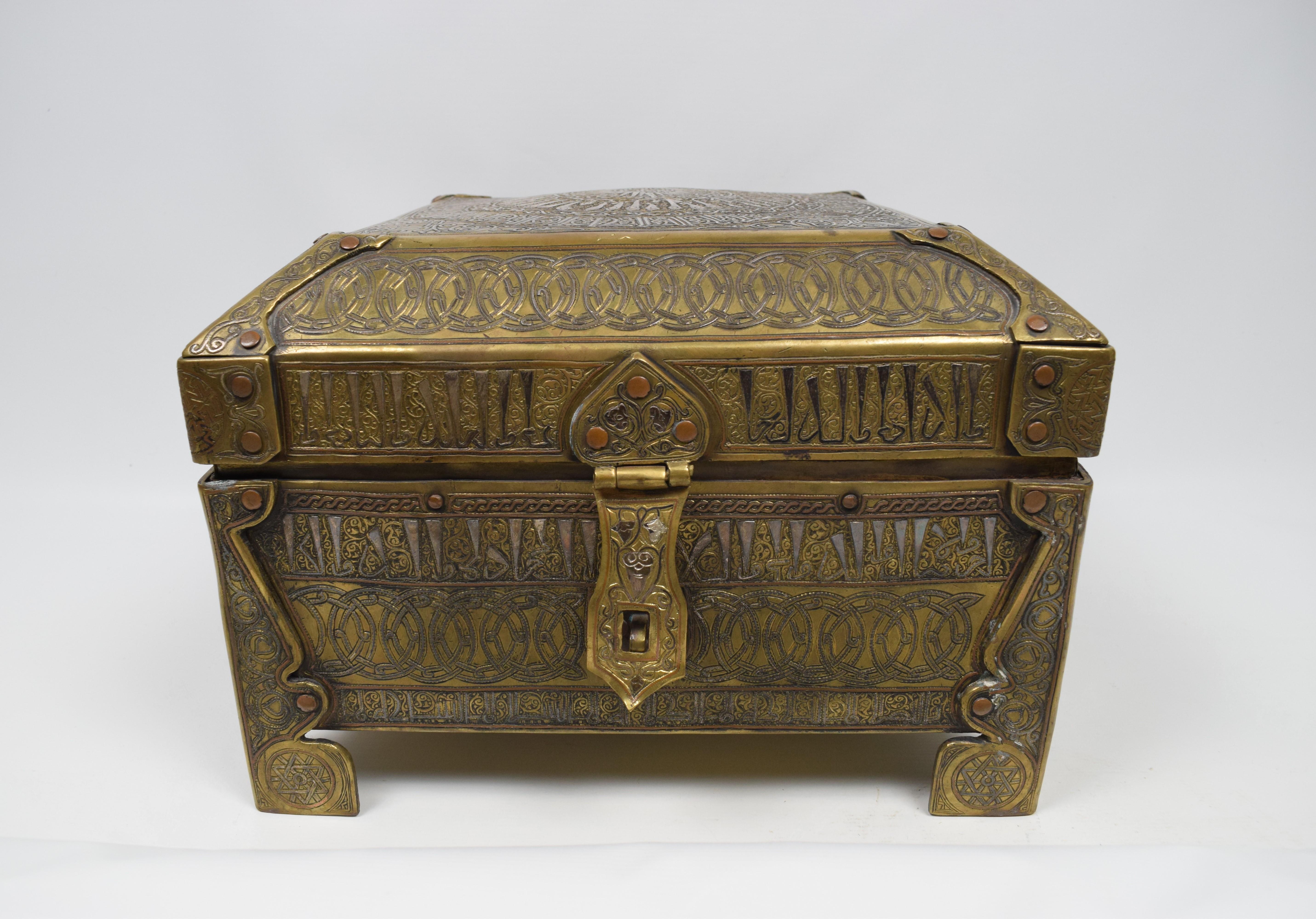 Islamic Middle Eastern brass with silver inlaid Calligraphy box, Mamluk Cairoware 19th century

Mamluk Revival Cairoware: It was made in the 19th and 20th centuries. It was a mix of the early Mamluk style, European styles, and ancient Egyptian