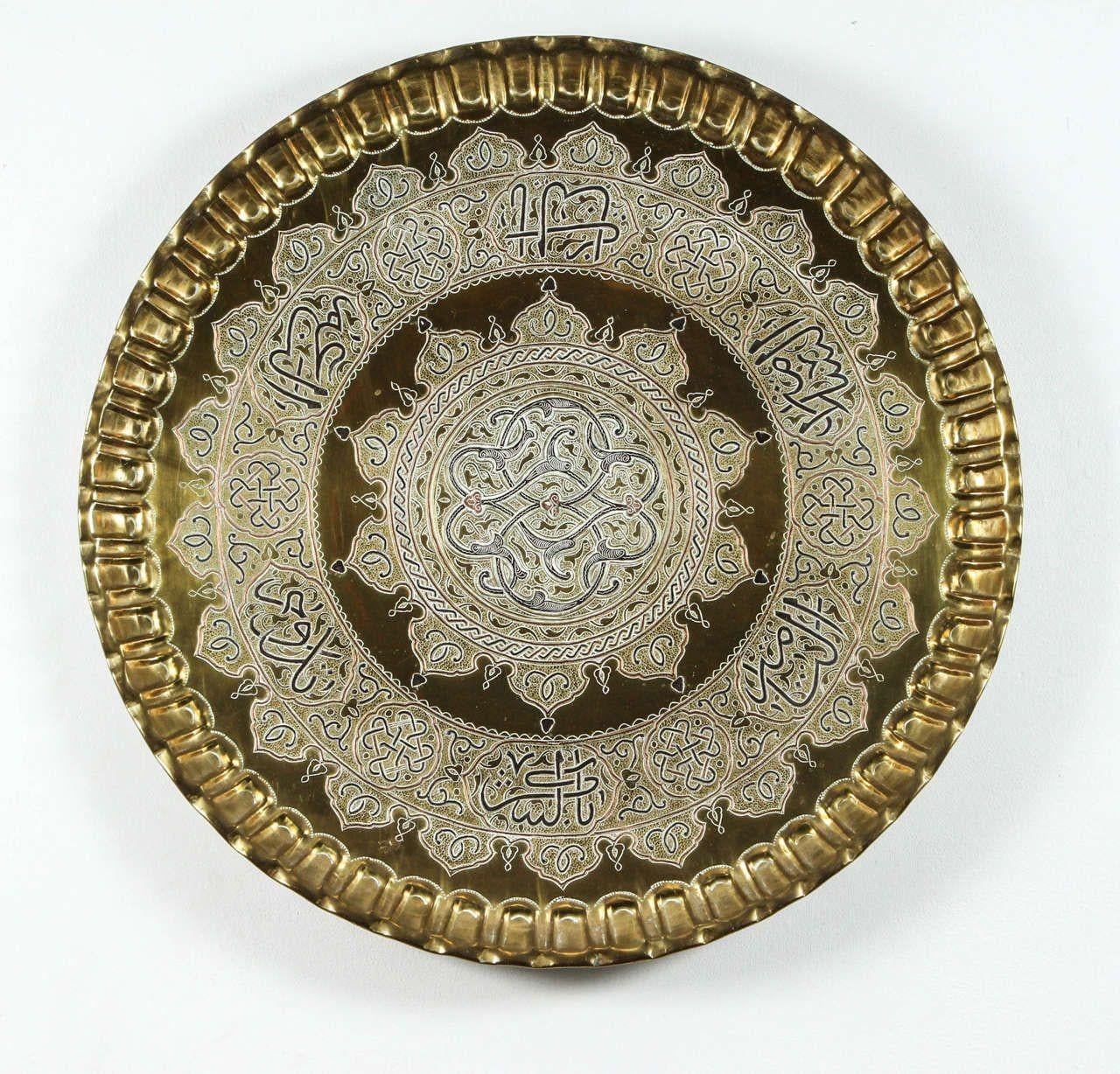Large Middle Eastern brass platter in Mameluke revival style, Islamic inlay metal charger artwork. Very decorative large hanging brass tray, the tray is very beautiful and unusual, engraved, embossed, inlaid and overlaid with silver, copper and