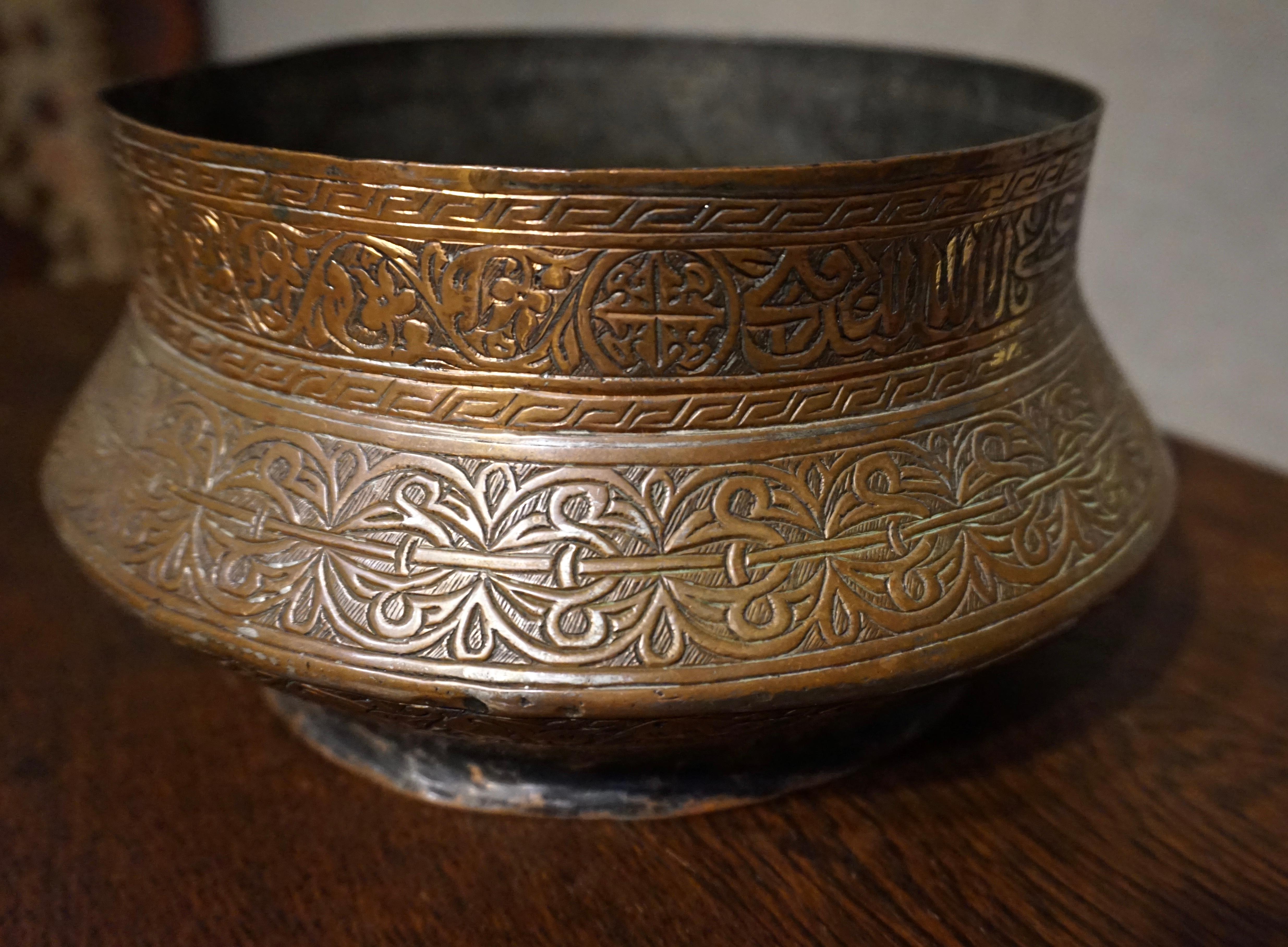 Rare Ottoman hand engraved copper and bronze bowl in original condition. Fine engraving and well proportioned conversation piece. Original patina still maintains tarnished lustre. Measures: 10