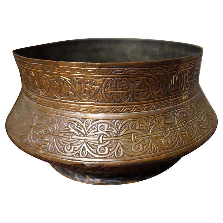 https://a.1stdibscdn.com/islamic-ottoman-hand-engraved-copper-and-bronze-bowl-kufic-script-for-sale/1121189/f_222382521611912409893/22238252_master.jpeg?width=768
