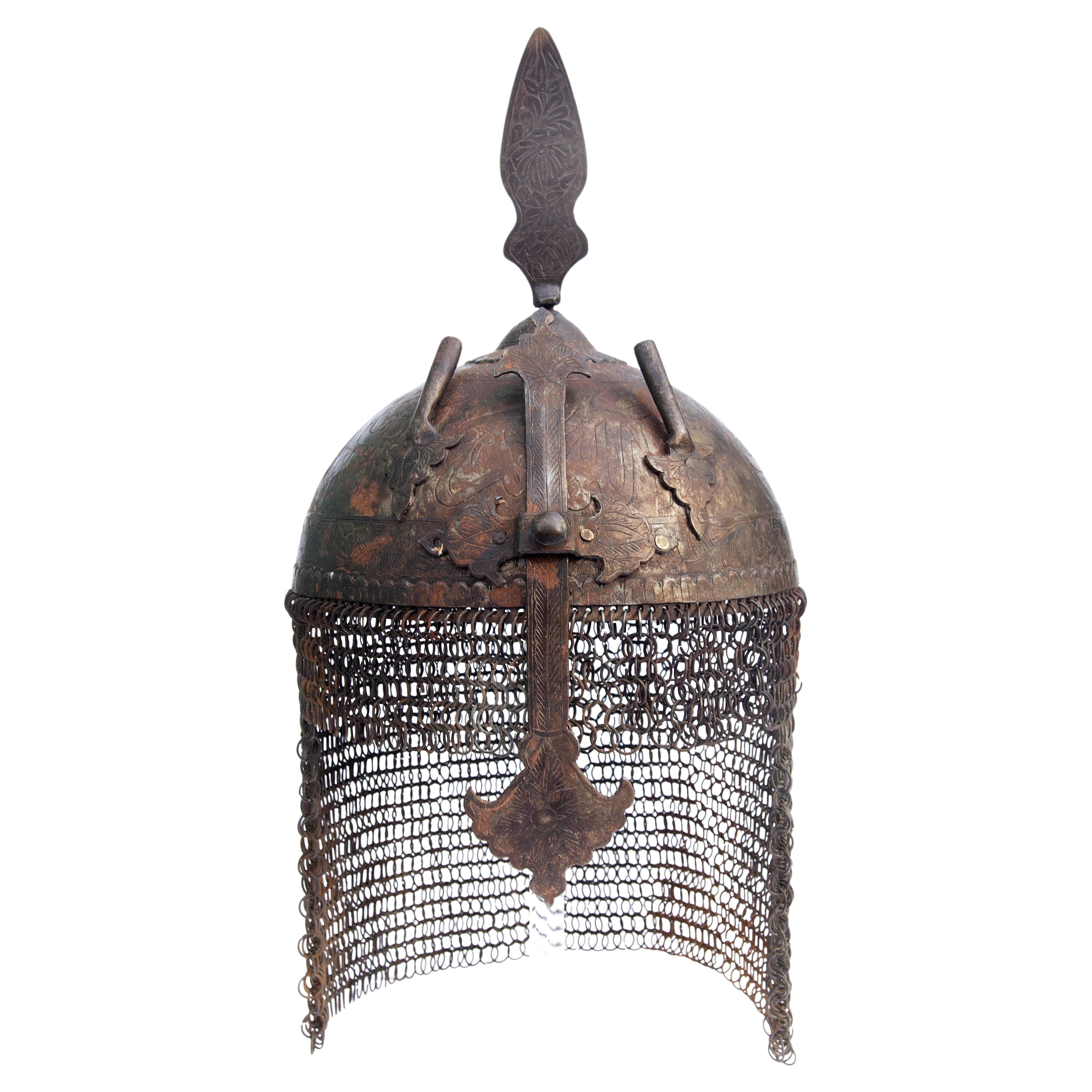 Islamic Persian iron helmet with chainmail. Engraved with Arabic symbols For Sale