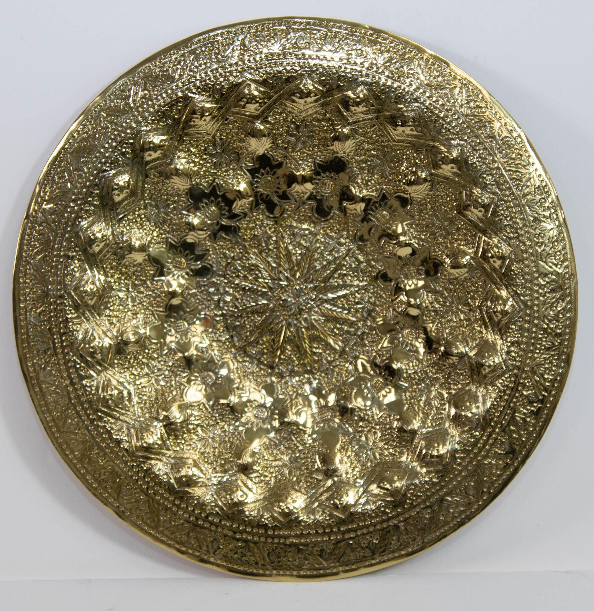 Fine antique circa 1920-1940s Middle Eastern Persian Brass Tray Polished Collectible Islamic Metalwork Platter.
The Islamic polished brass metalwork, antique brass tray is a remarkable piece of artistry that embodies the rich cultural heritage and