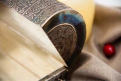 Islamic-style silver chest jewelry box with floral embossing and hinged handles