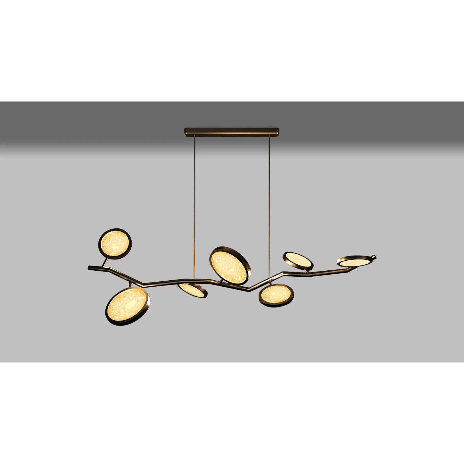 Island Circles Small Pendant Lamp by Dainte
Dimensions: D 44.5 x W 134 x H 79 cm.
Materials: Glass and brass. 

An extraordinary Island Pendant Circles, featuring seven circles, a combination of brass with glistening textured glass, when combined,