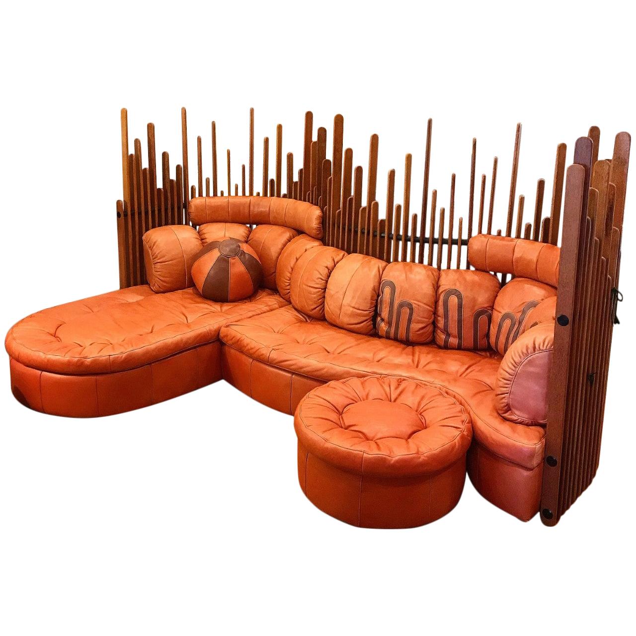 Stunning centerpiece for your home. The Isle D’Palm modular with its undulating shape and deep cushioning will become your favorite spot to rest and relax. 3 seating pieces that group together. The wooden spines that ring the back of the sofa are