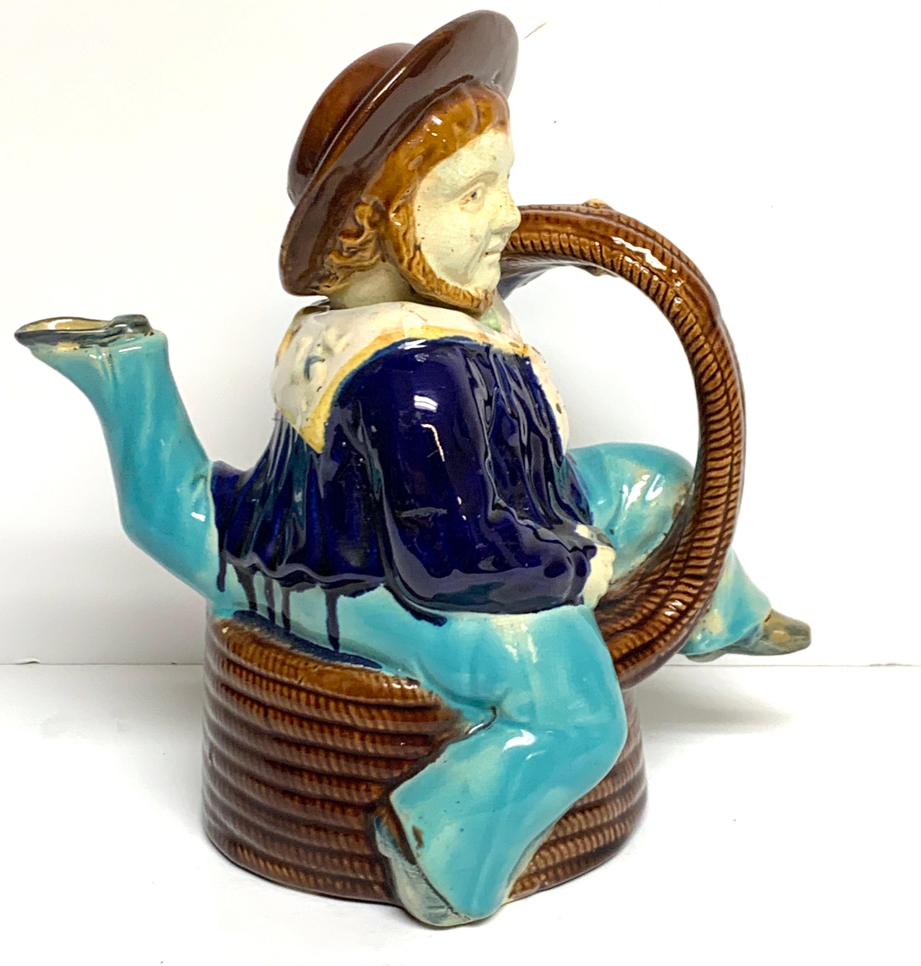 The Isle of Man Majolica 'Manx Sailor' Teapot, by William Brownfield & Sons
A special commission by the W. Broughton China rooms on Duke Street in Douglas, Isle of Man, circa 1875-1890. Modelled as a three legged Manx sailor in uniform, sitting on