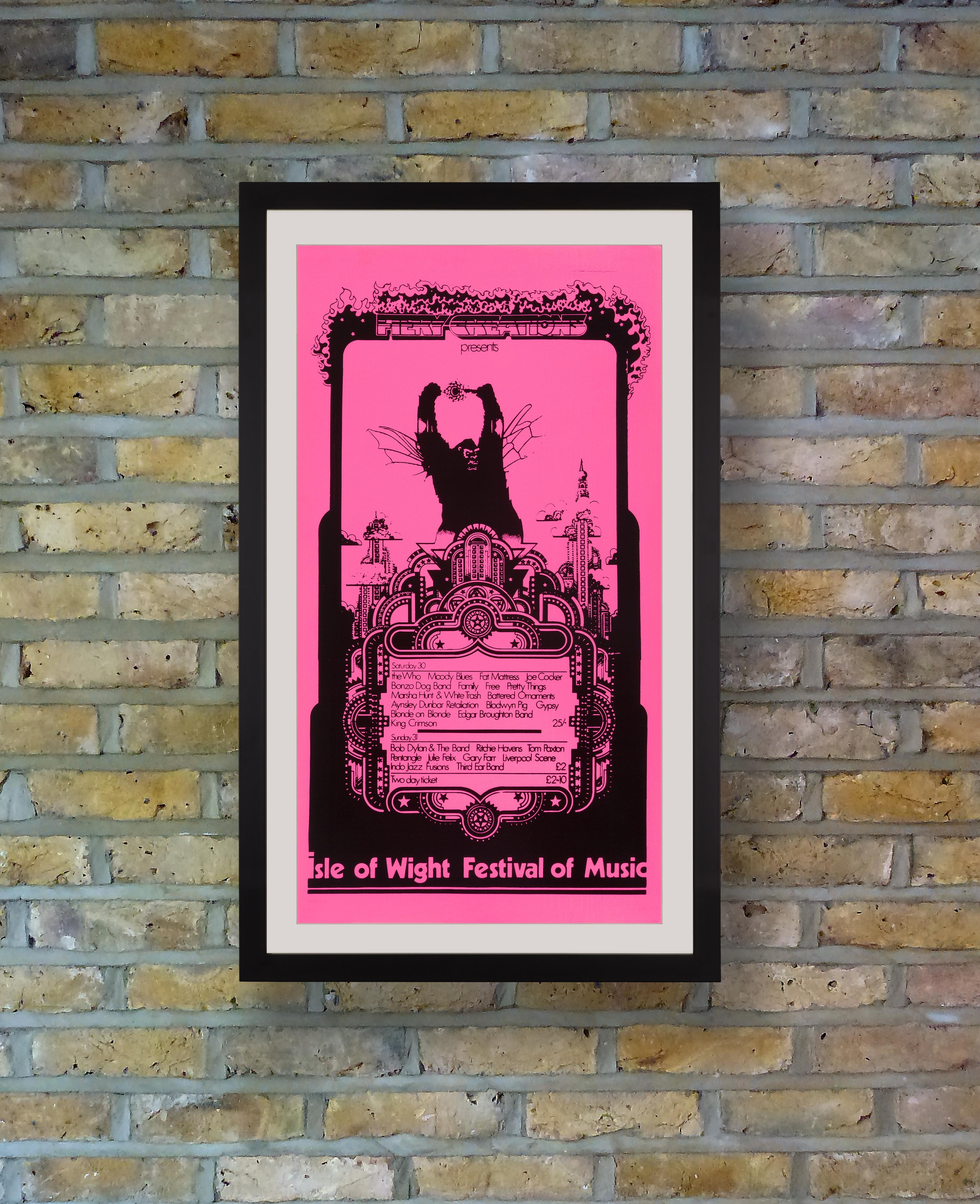 A shocking day-glo pink poster by Liverpudlian artist David Fairbrother-Roe for the UK's 1969 Isle of Wight Festival. Just 11 days after Woodstock, over 150,000 peace-loving revellers from all over the world descended on the Isle of Wight on 29