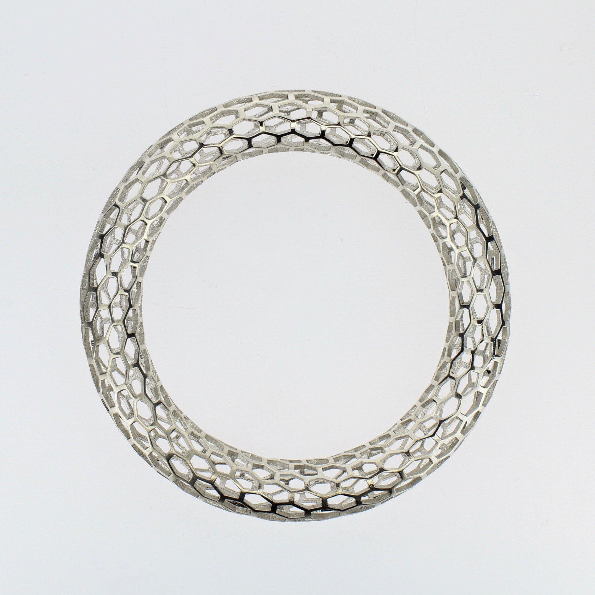 The islet narrow bracelet is a Doug Bucci's production-line wearable from his long-standing Islet series of 3D printed jewelry. 

Doug Bucci is a leading-edge Technology-Age American jewelry designer based in Philadelphia, Pennsylvania.

This
