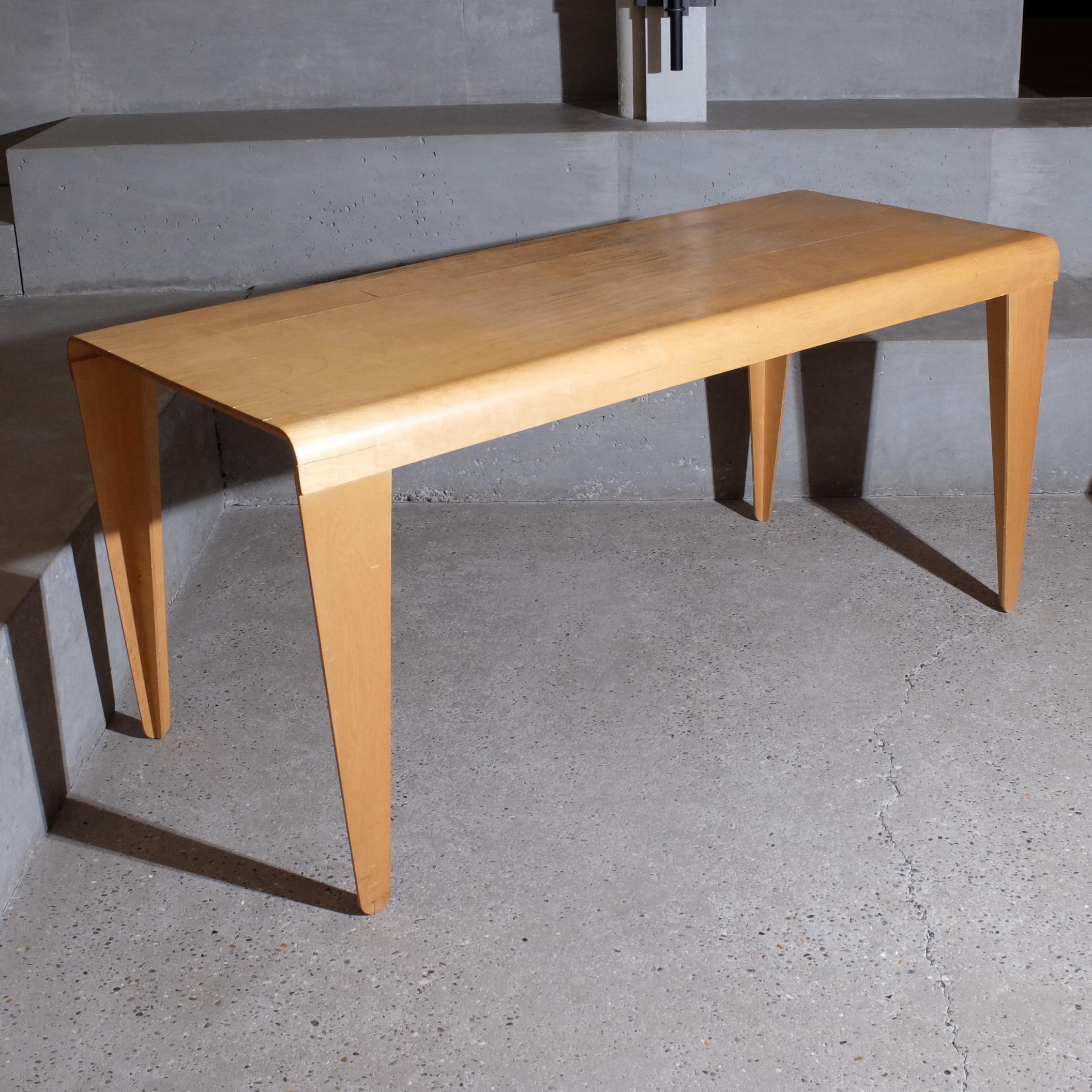 Isokon dinning table 1 out of 4 
Long version model in 157cm x 66 cm x 72 cm made in collaboration with Breuer, Gropius and Jack Pritchard.
T section leg housed into the ply with a little shouldered tenon into the groove.

 