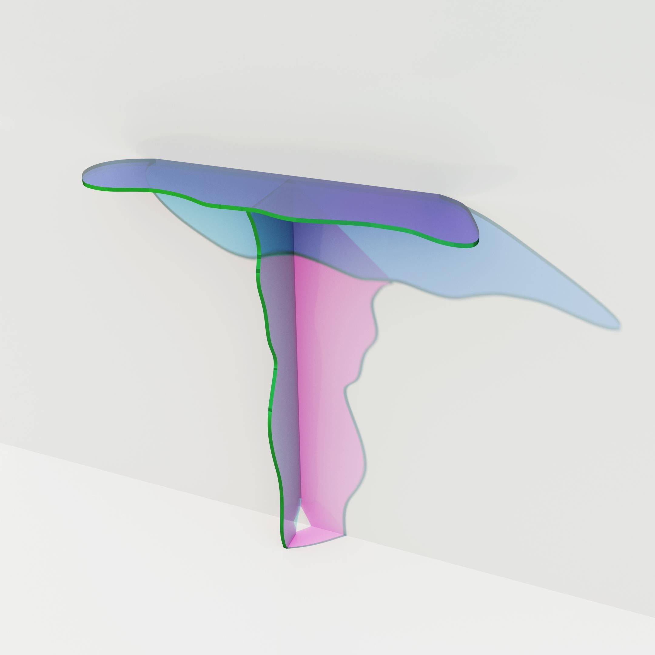 Isola console table by Brajak Vitberg
Dimensions: 30 x 100 x 100 cm
Materials: Dichroic glass, metal fixture details

The table is made out of glass with satin finish and dichroic insert.
The colors in this kind of satin finish are more subtle