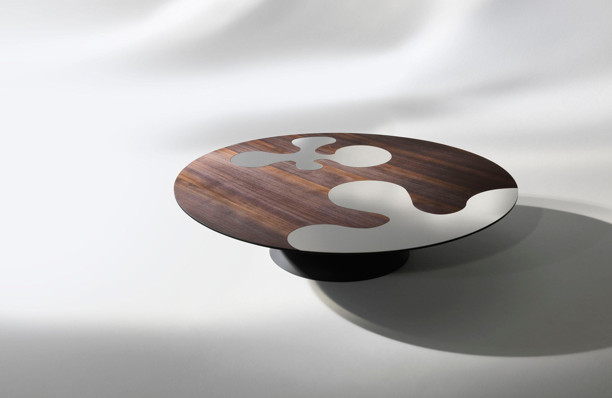 eries of coffee tables  inspired by the 
islands of the Venetian lagoon. Valuable the  
brushed heat-treated larch top workmanship  cookie color with inserts 
stainless in version 1. steel inserts in version 1 is worthwhile.
Islands 2: top and base