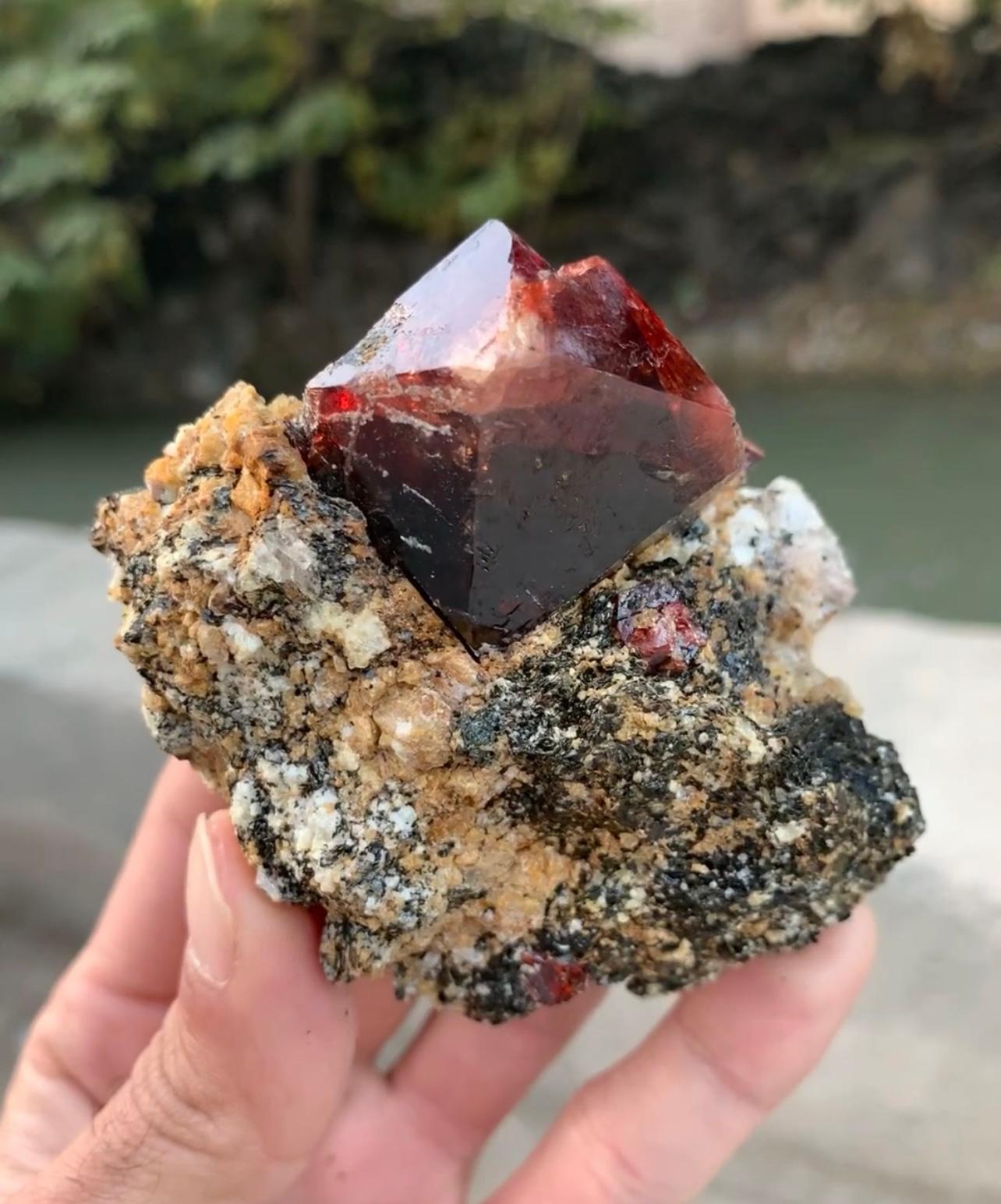 Contemporary Isometric Red Zircon Crystal On Graphite And Calcite Matrix From Pakistan For Sale