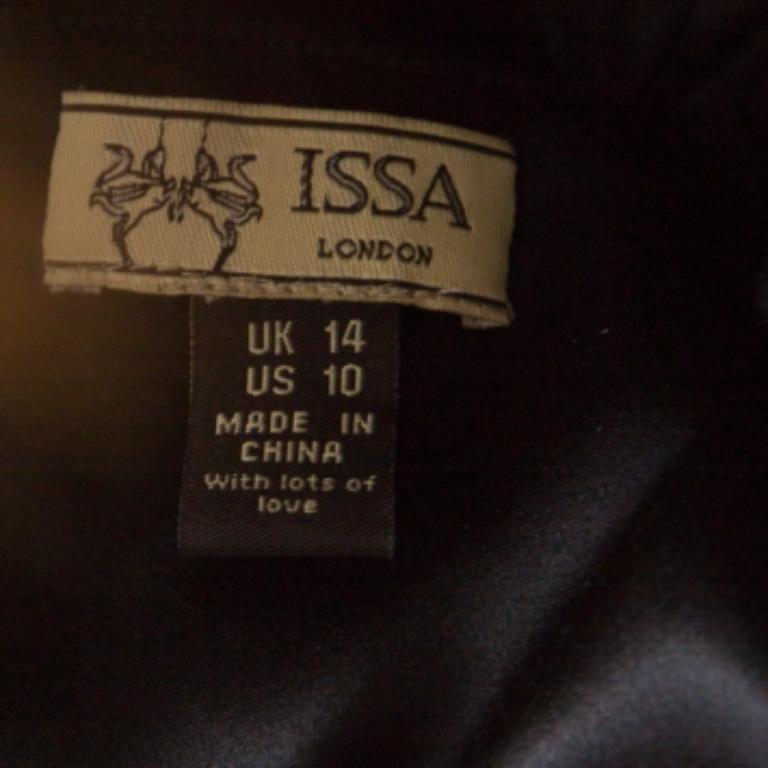 Issa Schwarzes Seidenkleid mit Puffärmeln und Schleifendetail vorne Kurzes Kleid L im Zustand „Gut“ im Angebot in Dubai, Al Qouz 2