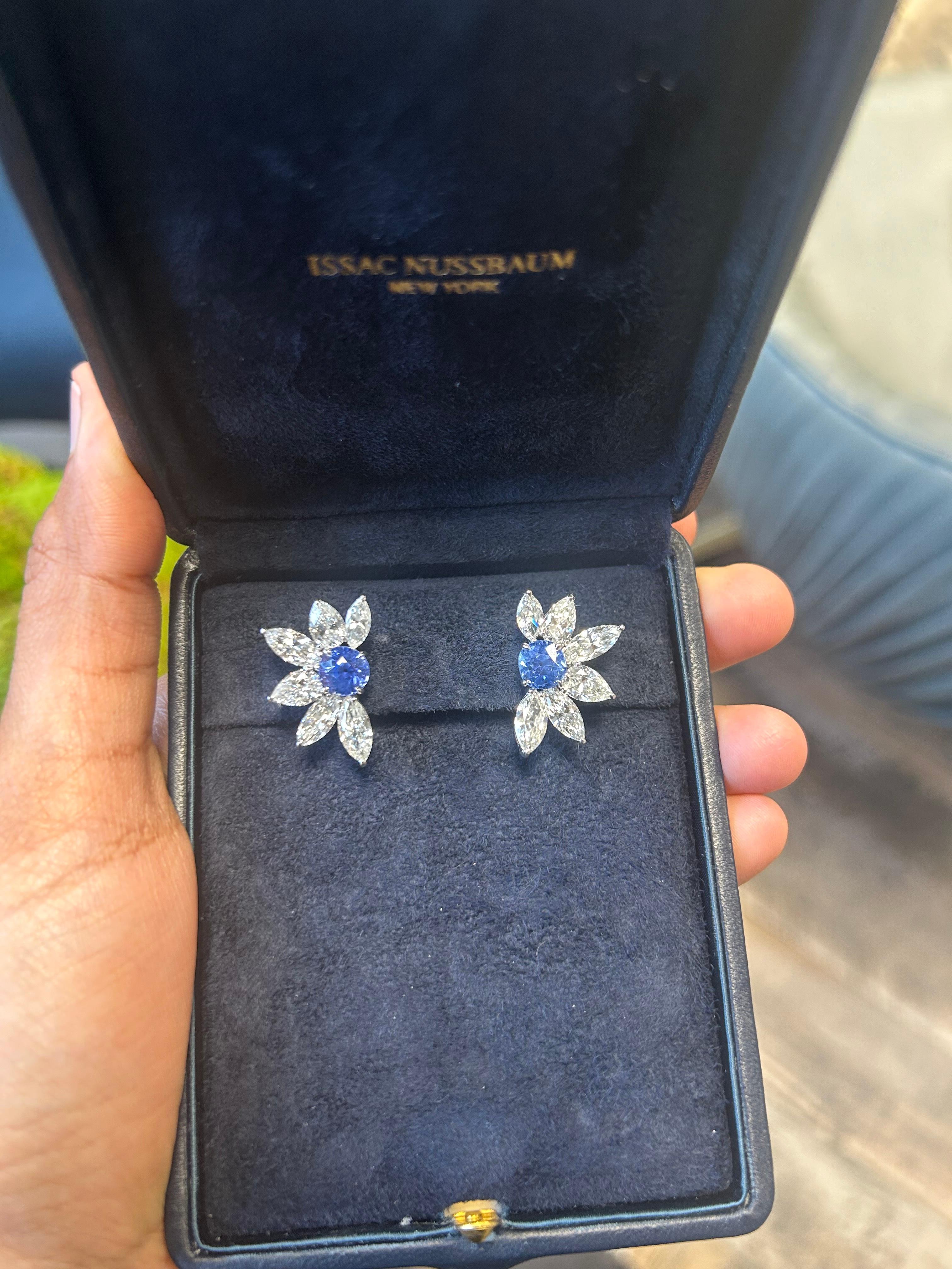 This 18K white gold cashmere-inspired earring is a delicate and luxurious piece that combines the softness and elegance of its namesake fabric with a brilliant gemstone design. At the heart of the earring is a mesmerizing blue sapphire with 2 carat