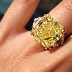 Issac Nussbaum 13.06 Carat Fancy Yellow Radiant Diamond and 2 Half Moon 1.00 CTW