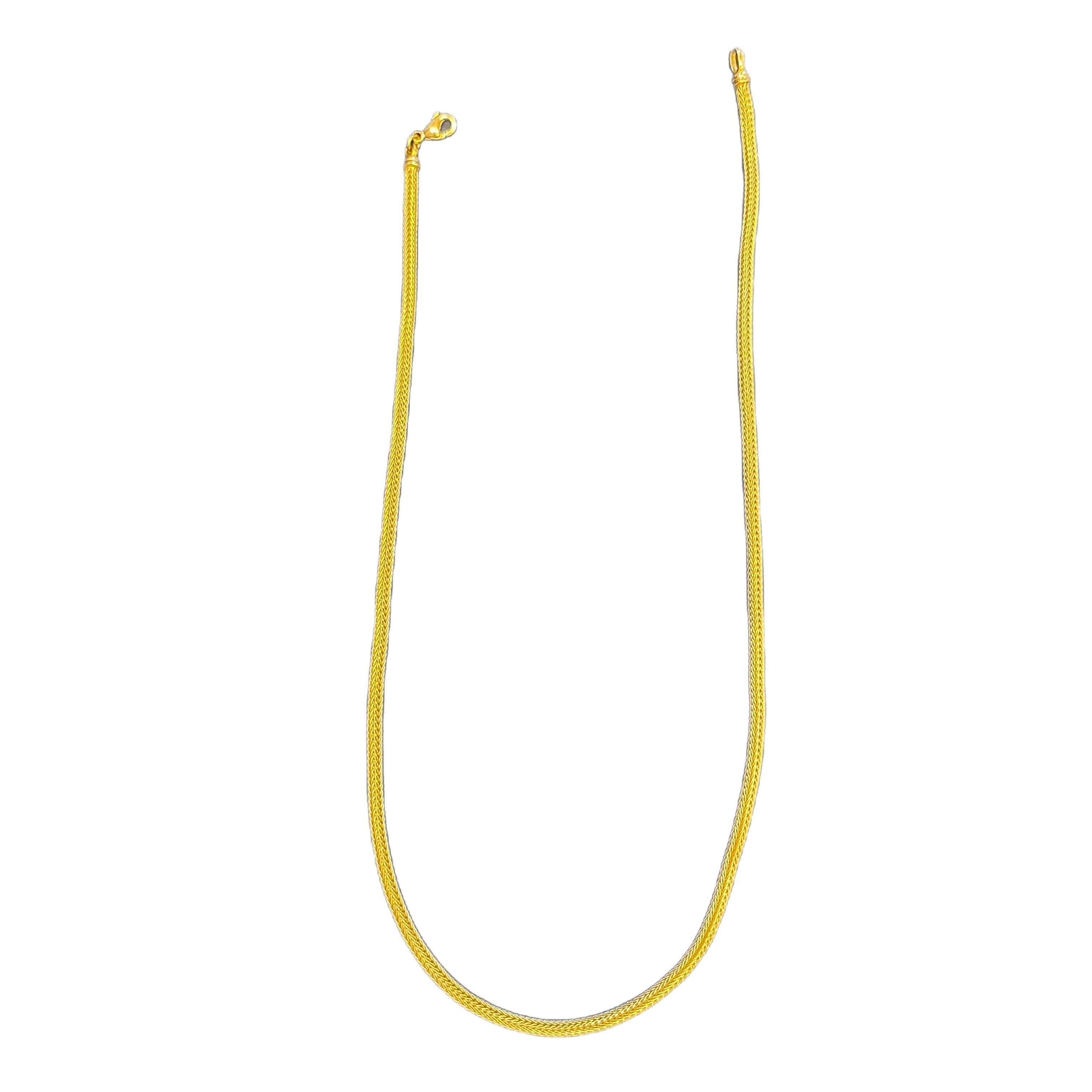 Yellow gold necklace made in Germany. 
This light and easy to wear necklace is a great casual piece with elegant flair. 
Crafted in Finley woven 18 Karat gold. Wear it plain or as a base for your layered looks.
Approximately 21 grams. 


  All items