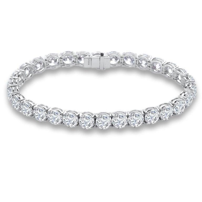 Sophisticated elegance. 
Handcrafted in 18k white gold. Set with 48 round ideal cut brilliant diamonds for a total carat weight of 8.84.
The Diamonds are near colorless (D-F) and having clarity of VS2.
We designed this bracelet as very low profile