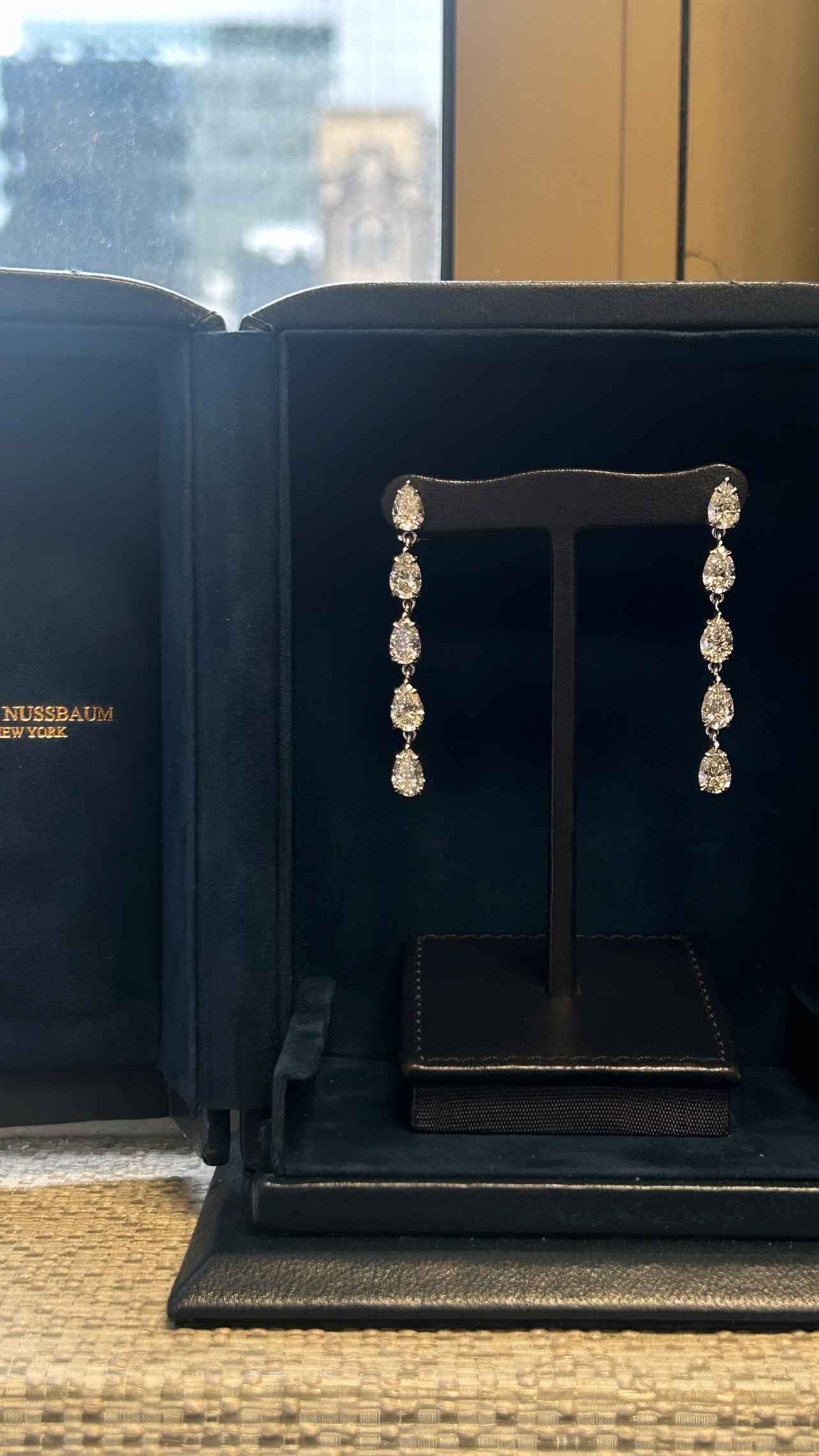 These exquisite GIA-certified  platinum pear-shaped natural diamond earrings feature a total carat weight of 7.21, making them a breathtaking addition to any jewelry collection. Each diamond is carefully selected from the pristine D-E-F color range,