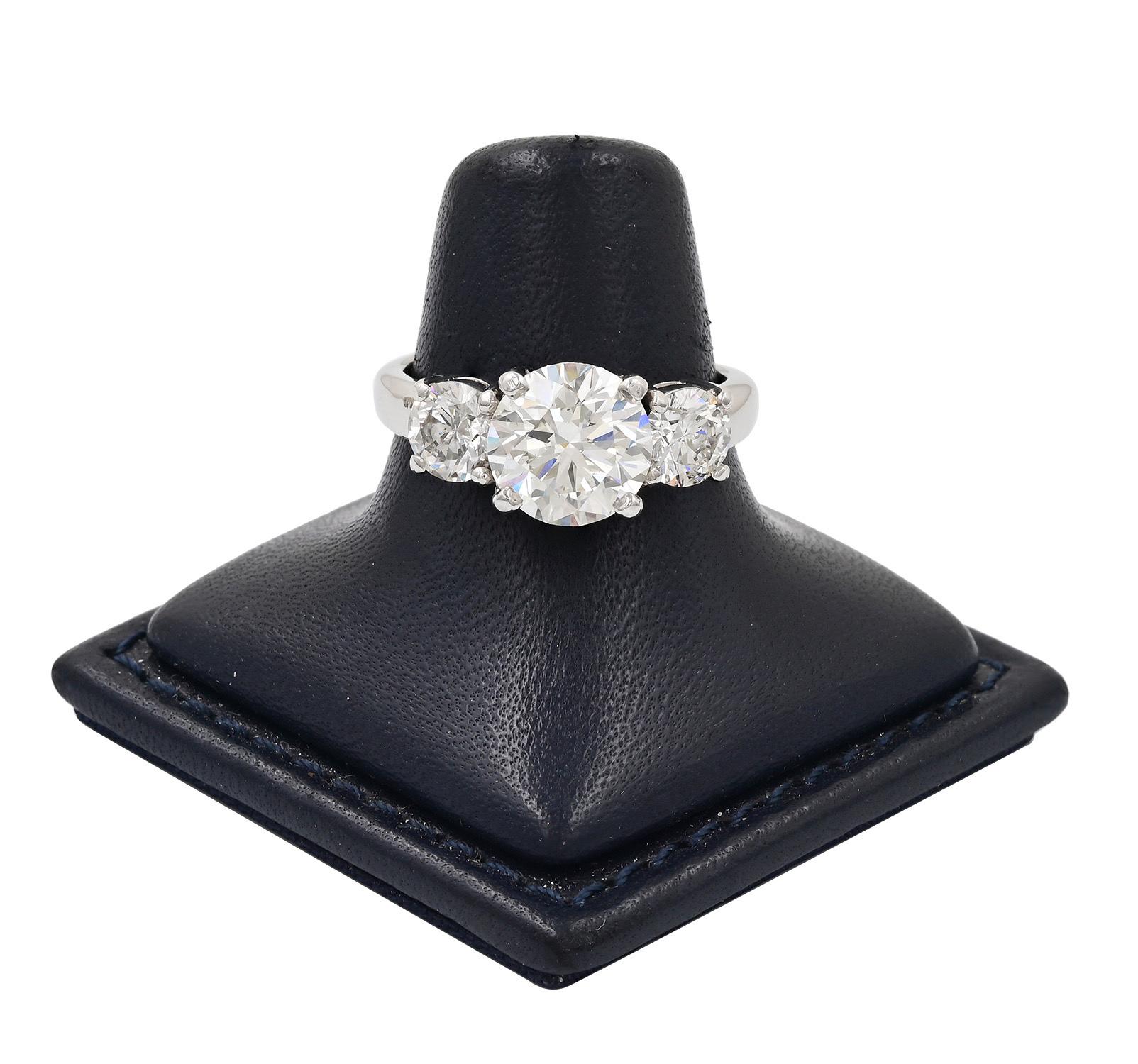 This beautiful engagement ring consists of 2.50 carat center stone graded by the GIA as near colorless and has a clarity of slightly included one.
Mounted with a perfect match round brilliant cuts weighing 1.01 carat total 
We at issac nussbaum