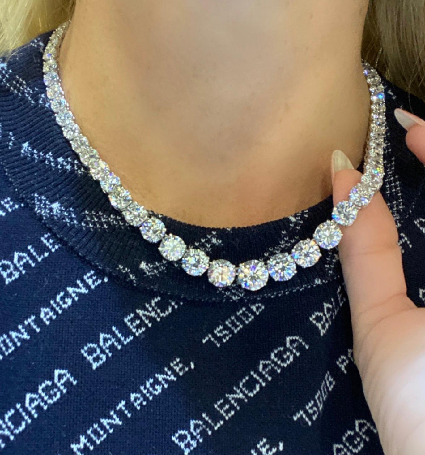 Incredible diamond graduated riviera diamond necklace
crafted in hand made platnium, showcasing 68 extraordinary ideal round brilliant cut diamonds, each stone individually graded by the GIA.
weighing 54.09 total carat weight, diamonds range DEFG