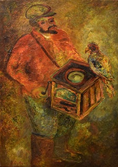 El organillero con un loro