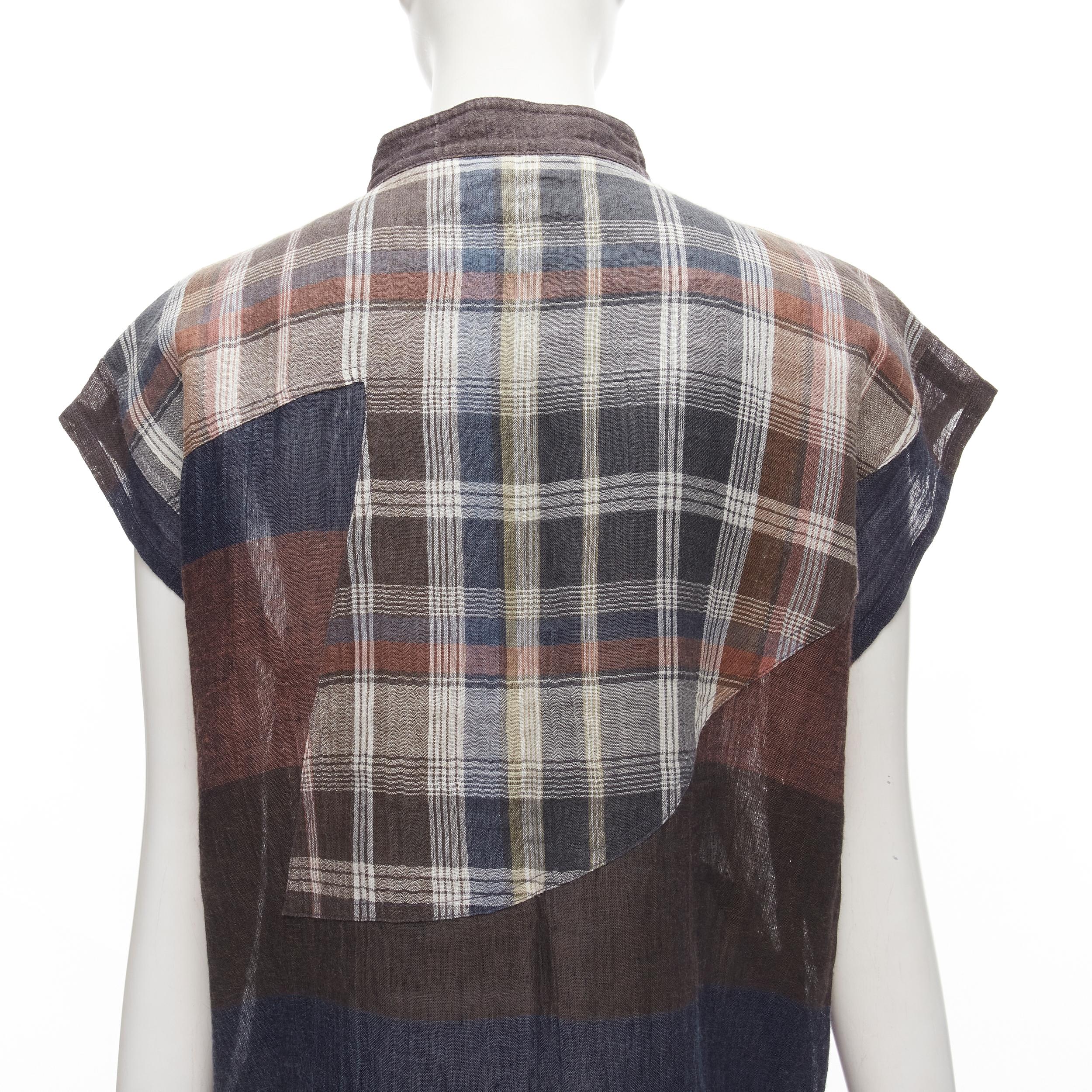 ISSEY MIYAKE 1980's Vintage brown navy stripes checked patchwork linen shirt JP9 S
Reference: TGAS/C01937
Brand: Issey Miyake
Material: Linen
Color: Brown, Blue
Pattern: Striped
Closure: Button
Extra Details: iridescent shell buttons. Check and