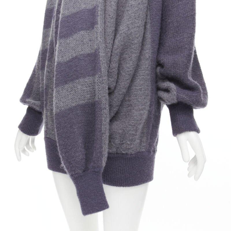 ISSEY MIYAKE 1980's Vintage deconstructed 3 sleeves striped sweater dress M Rare
Reference: CRTI/A00521
Brand: Issey Miyake
Collection: 1980s
Material: Wool
Color: Purple
Pattern: Striped
Extra Details: Turtleneck. 3-sleeve design.
Made in: