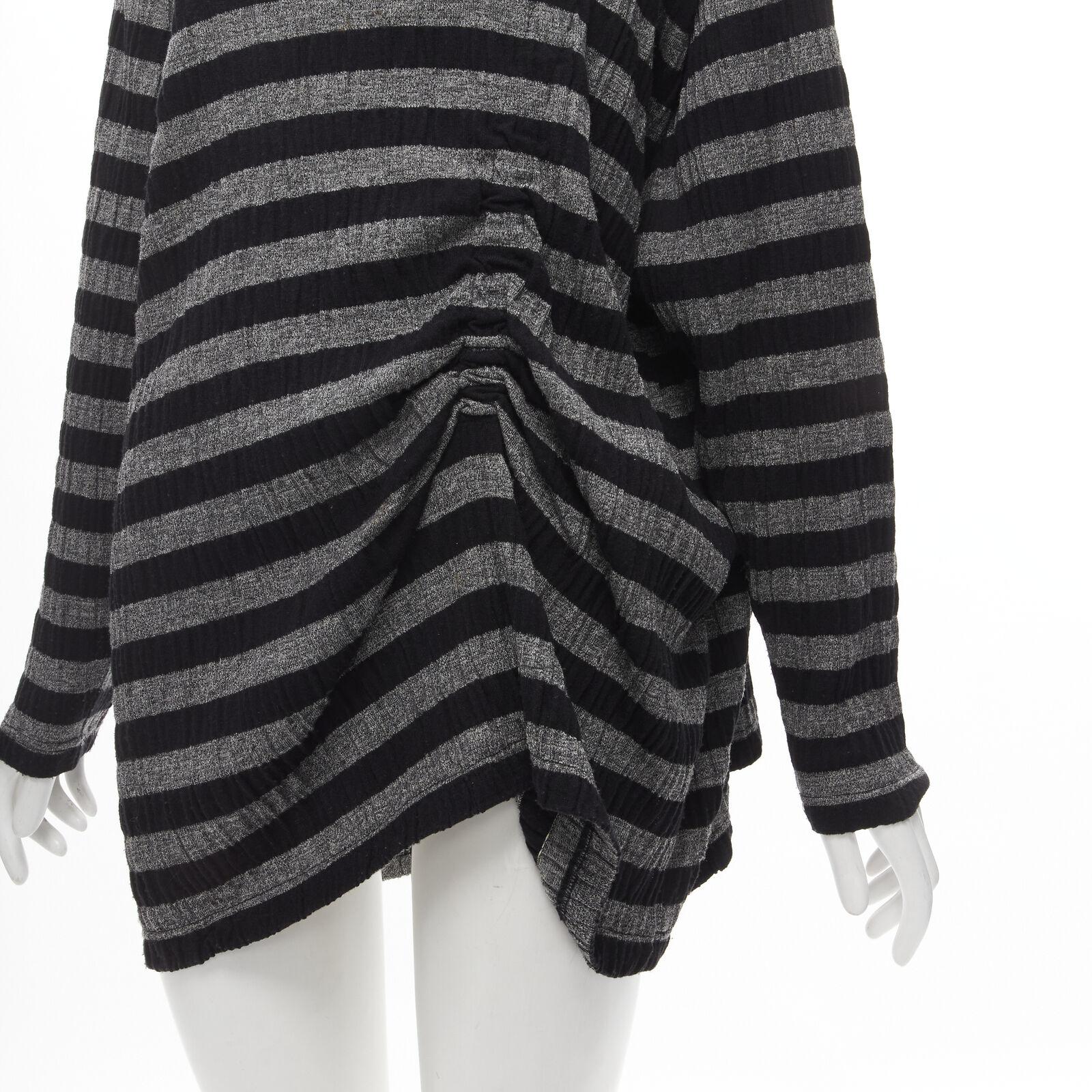 ISSEY MIYAKE 1980s Vintage grey black stripe draped gathered sweater S
Reference: CRTI/A00501
Brand: Issey Miyake
Collection: 1980s
Material: Acrylic, Wool
Color: Grey, Black
Pattern: Striped
Extra Details: Elastic band built into the sweater to