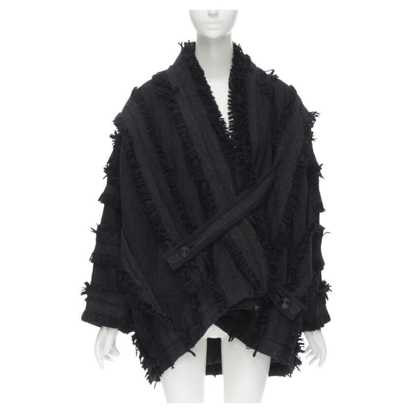 Cocoon fur coats and fringe wraps 2025