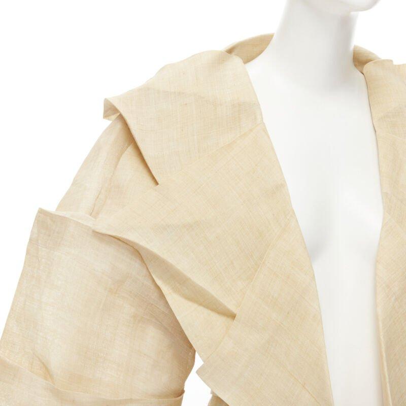 ISSEY MIYAKE 1991 Vintage Runway Dinosaur architectural pleated linen jacket XL
Reference: CRTI/A00121
Brand: Issey Miyake
Model: Dinosaur Jacket
Collection: Spring Summer 1991 - Runway
Material: Linen
Color: Beige
Pattern: Solid
Extra Details: