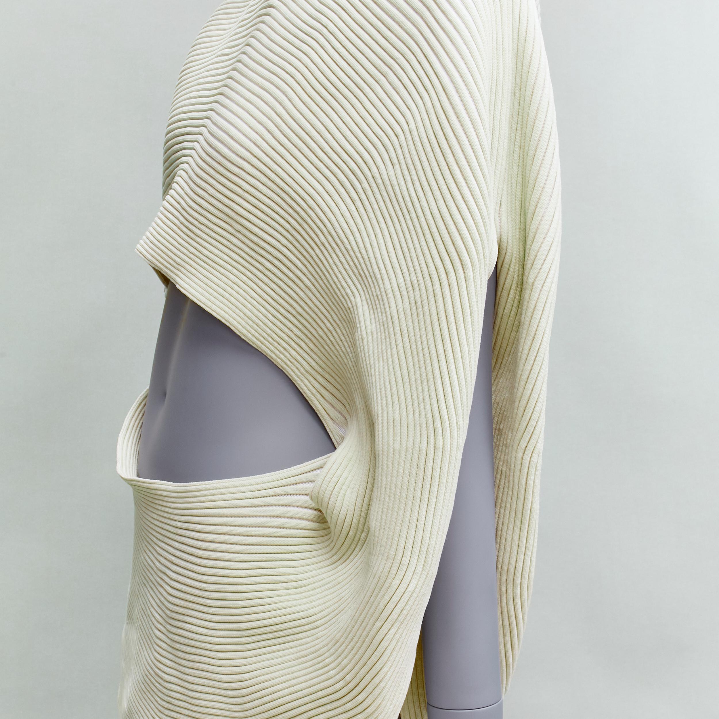 ISSEY MIYAKE 2022 Runway cream ribbed knit asymmetric 3D circle midriff cutout top JP2 M
Reference: TGAS/D00123
Brand: Issey Miyake
Collection: Spring 2022
Material: Polyester
Color: Cream
Pattern: Solid
Closure: Slip On
Made in: