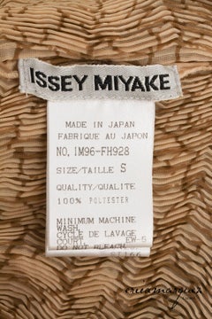 ISSEY MIYAKE, Archival Dress with Open Side Slits, Long Sleeveless Tunic, 1990s