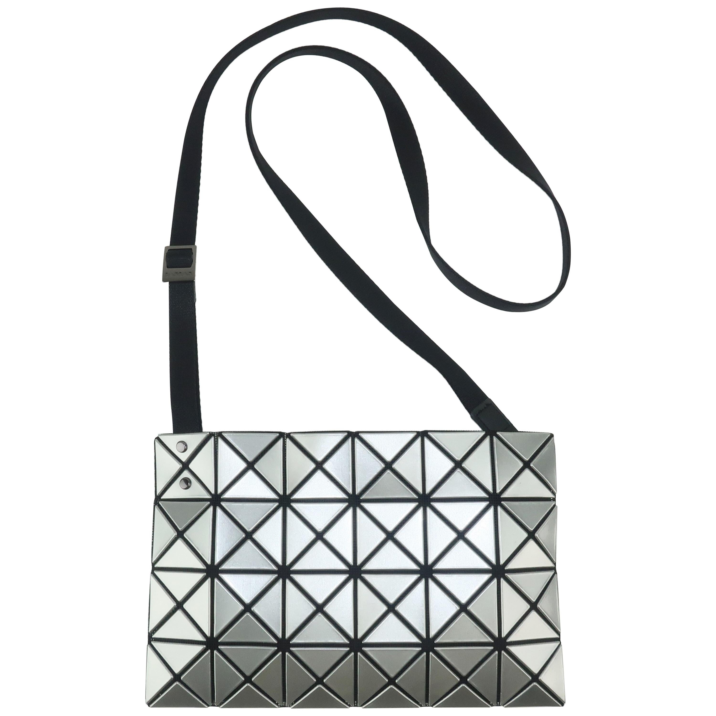 Issey Miyake Bao Bao Silver Triangle Handbag at 1stDibs | bao bao issey  miyake black baguette shoulder bag, issey miyake folding bag, issey miyake  triangle bag