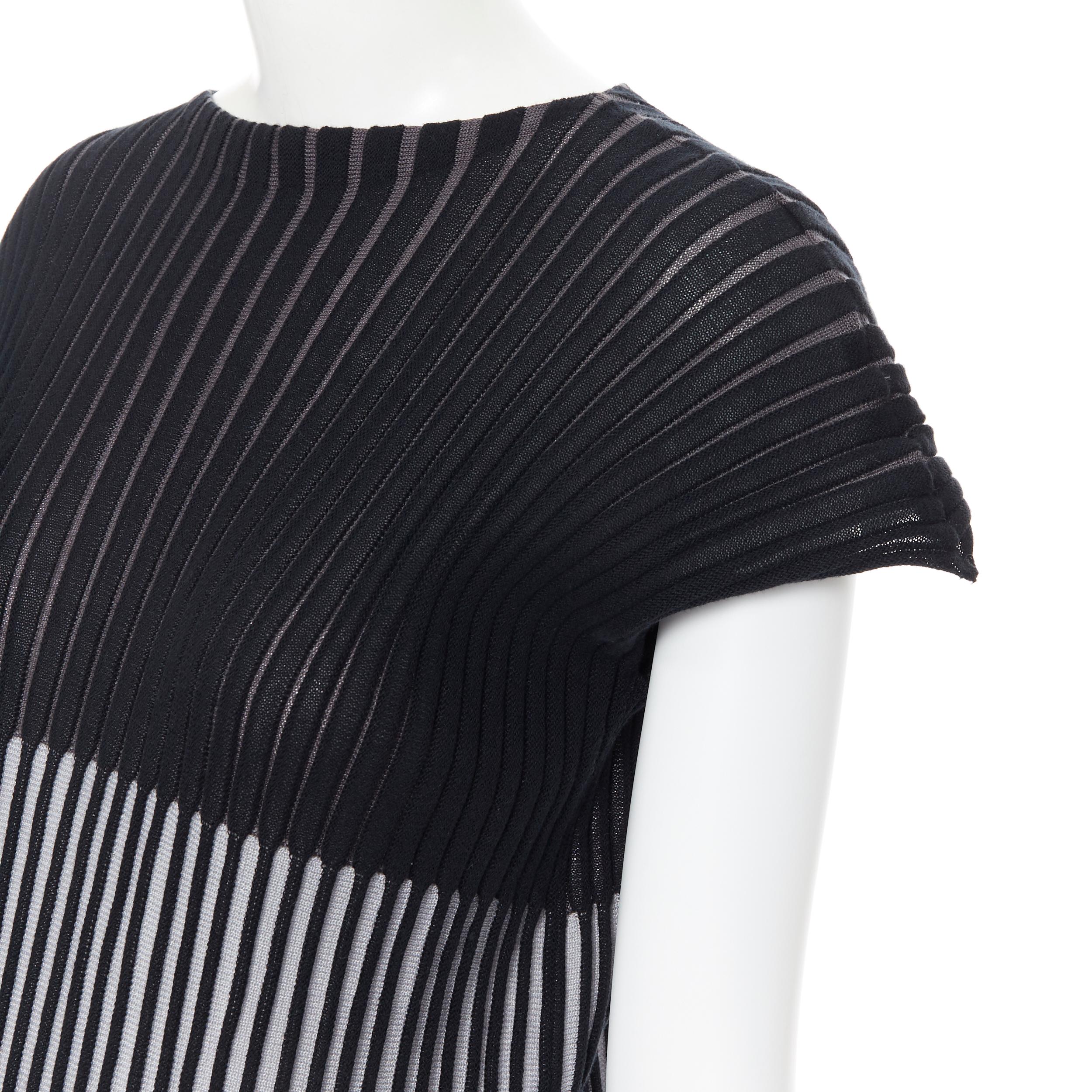 ISSEY MIYAKE black grey ribbed knitted cap sleeve stretch mini dress JP2
Brand: Issey Miyake
Model Name / Style: Pleated dress
Material: Cotton blend
Color: Grey
Pattern: Striped
Extra Detail: Pleated signature.
Made in: Japan

CONDITION: