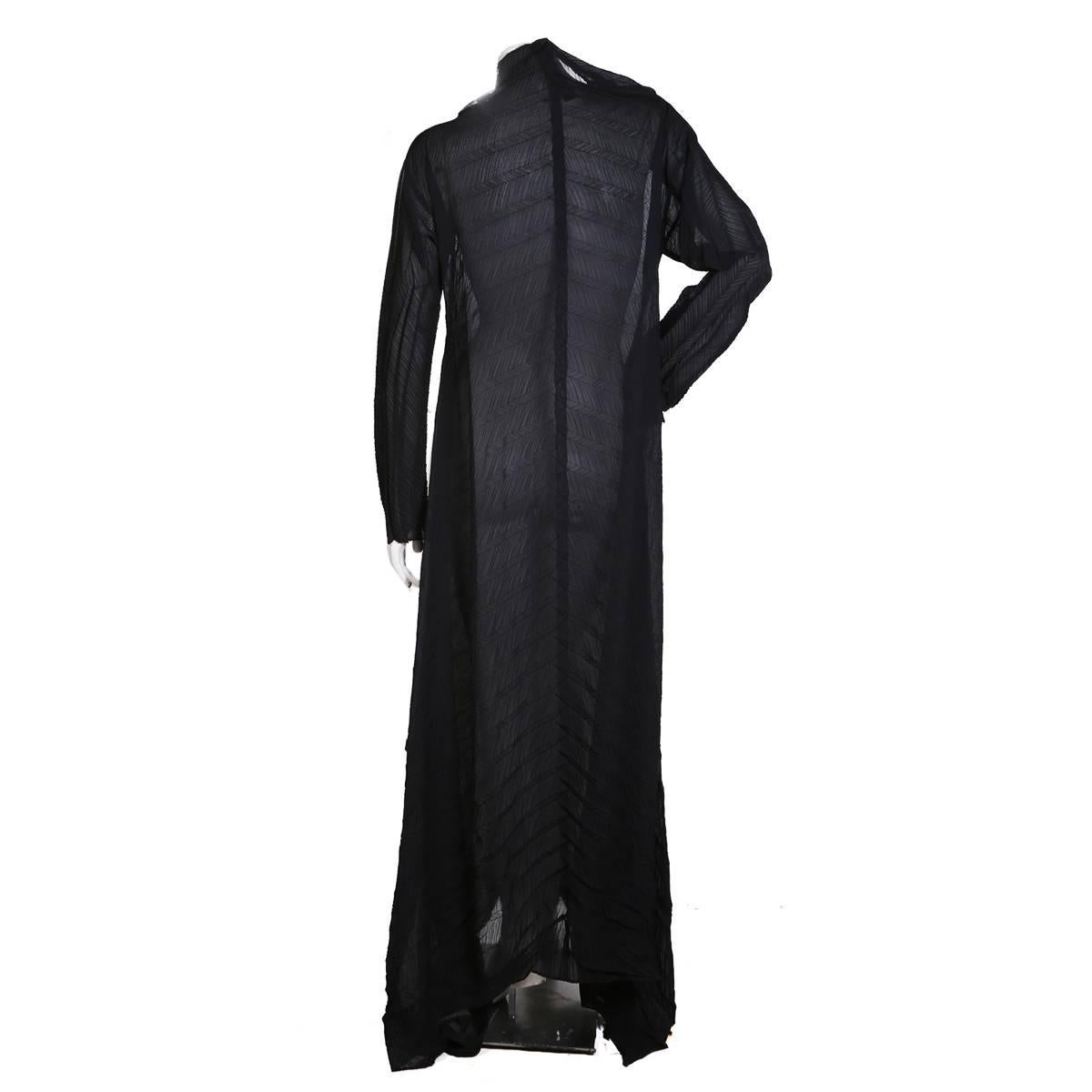 Product Details:
Vintage dress from Issey Miyake
Long sleeves, maxi length
Pleated thin polyester fabric
Condition: Great, missing tag

Size/Measurements:
42