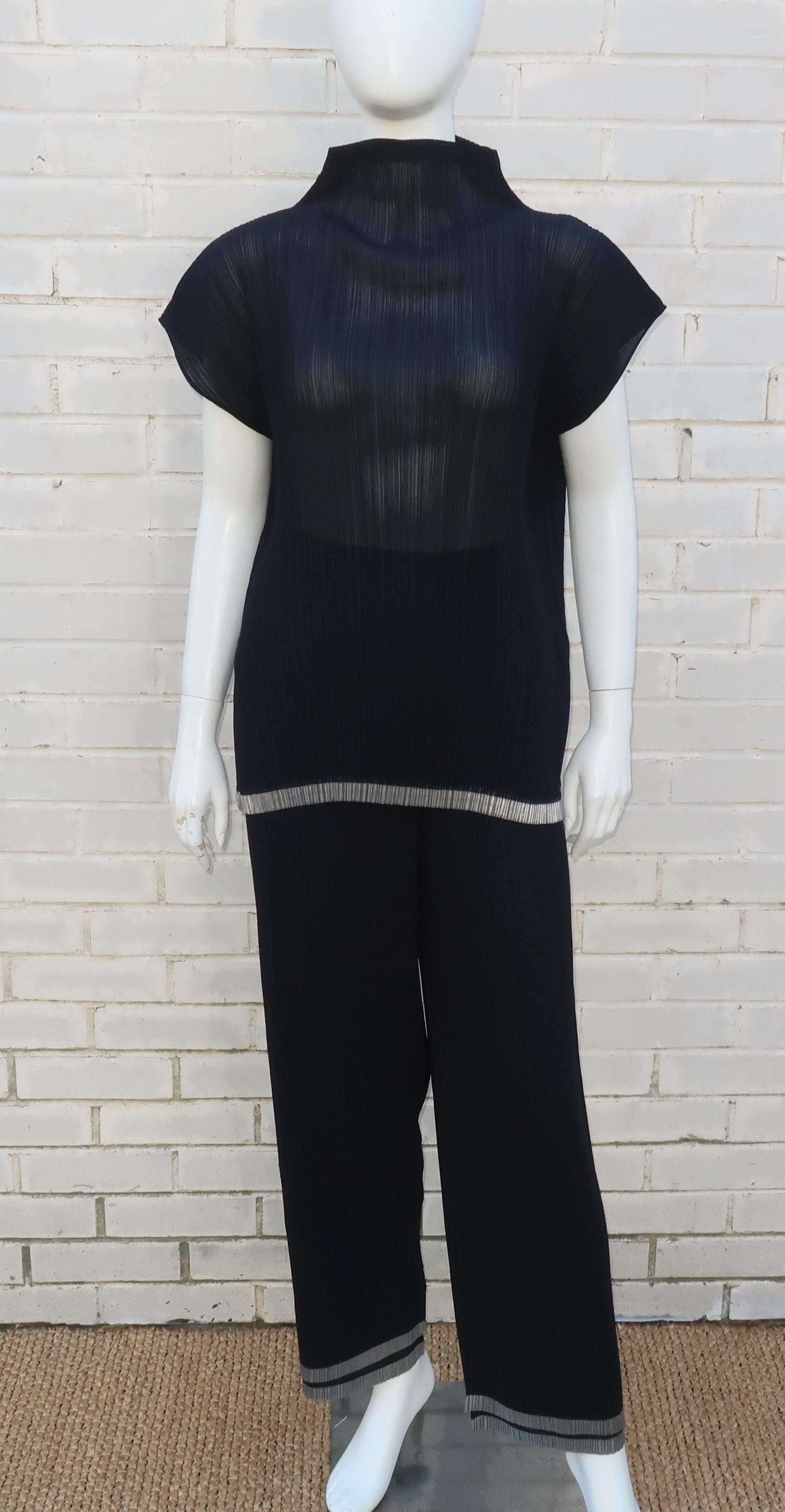 Issey Miyake's designs are the modernist Japanese version of Mario Fortuny's pleated Delphos gowns with attention paid to both the human form and ease of movement.  This three piece ensemble consists of a pullover top, elasticized waist two tier