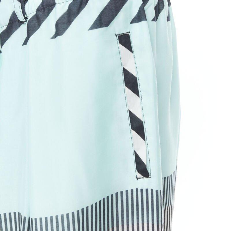 ISSEY MIYAKE blue green stripe colorblocked polyester wide leg summer pants L
Reference: AEMA/A00018
Brand: Issey Miyake
Material: Polyester
Color: Blue, Green
Pattern: Striped
Closure: Zip
Extra Details: Dual button zip fly front. Elasticated