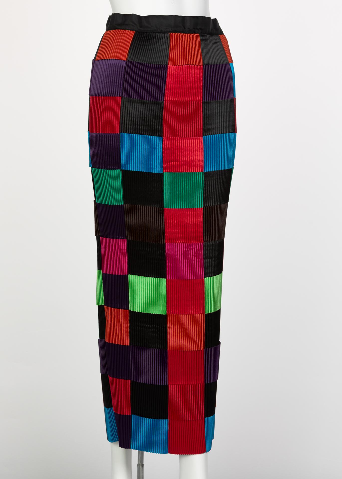 Issey Miyake has a unique architectural aesthetic mixing concepts that typically would be avoided by most designers. Fine, micro-pleating, one of his favorites, is incorporated into nearly all of his designs. This skirt is fascinating as it is made