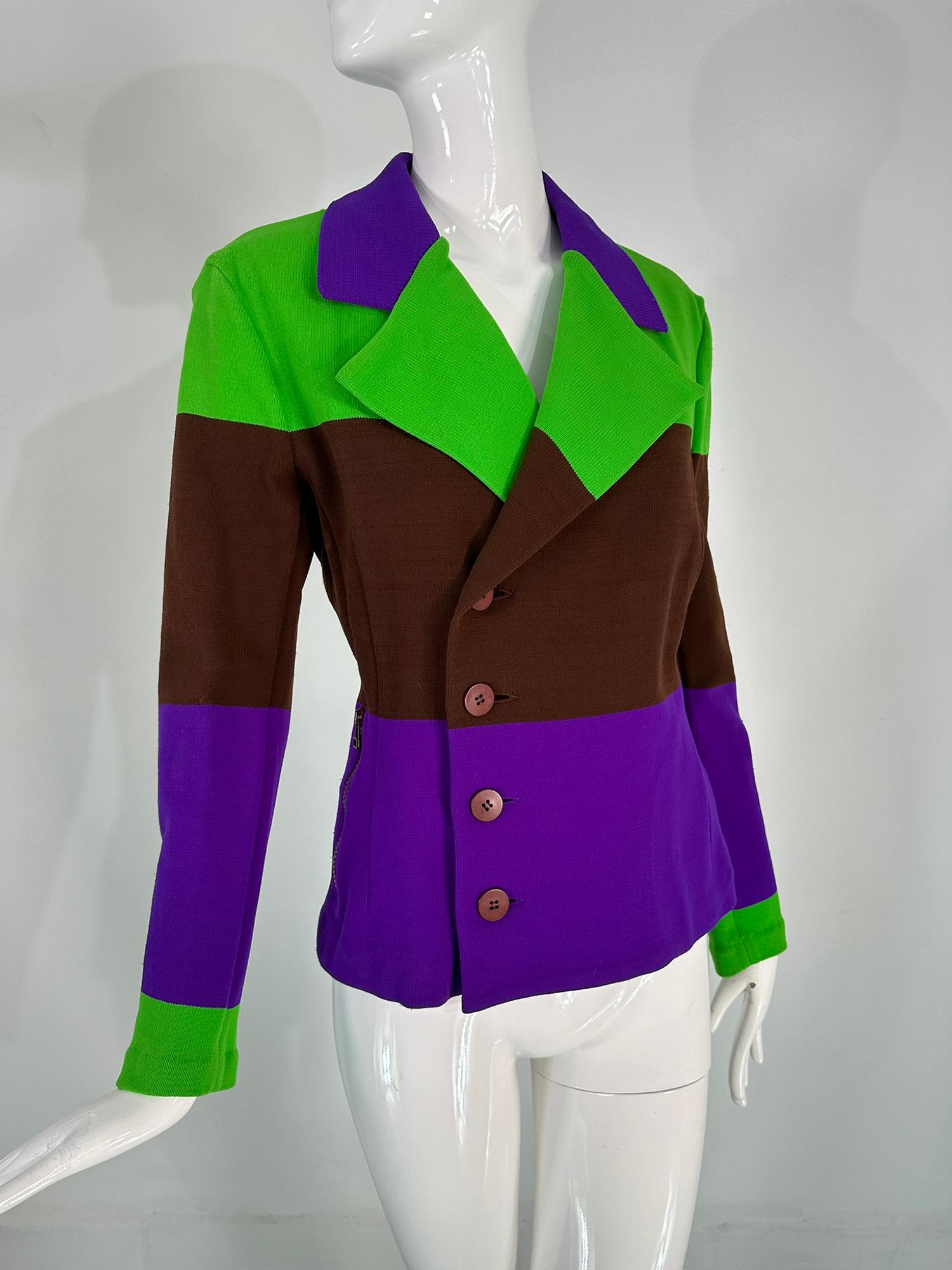 Issey Miyake colour block nylon knit jacket in acid green, brown & purple. Side button jacket with wide notched lapels. Long sleeves. Chunky zipper hip side pockets. Unlined. Marked size small.
 In excellent wearable condition.  All our clothing is