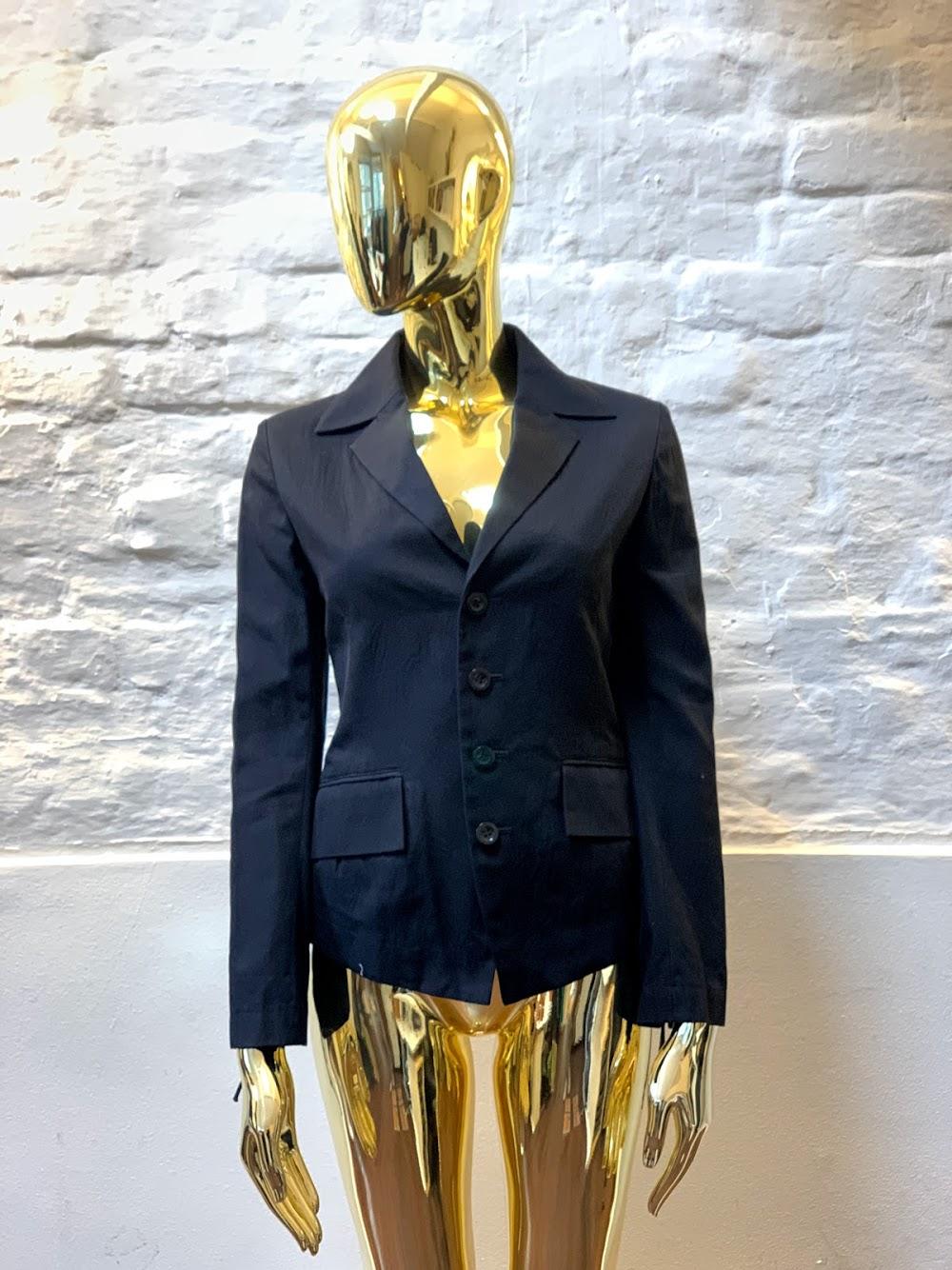 Issey Miyake Corset Leather Tie Jacket made in Japan from cotton and leather. 

Issey Miyake's first collection was launched in New York in 1971, and began to be shown in Paris Fashion Week from Autumn Winter 1973.

From the very beginning to this