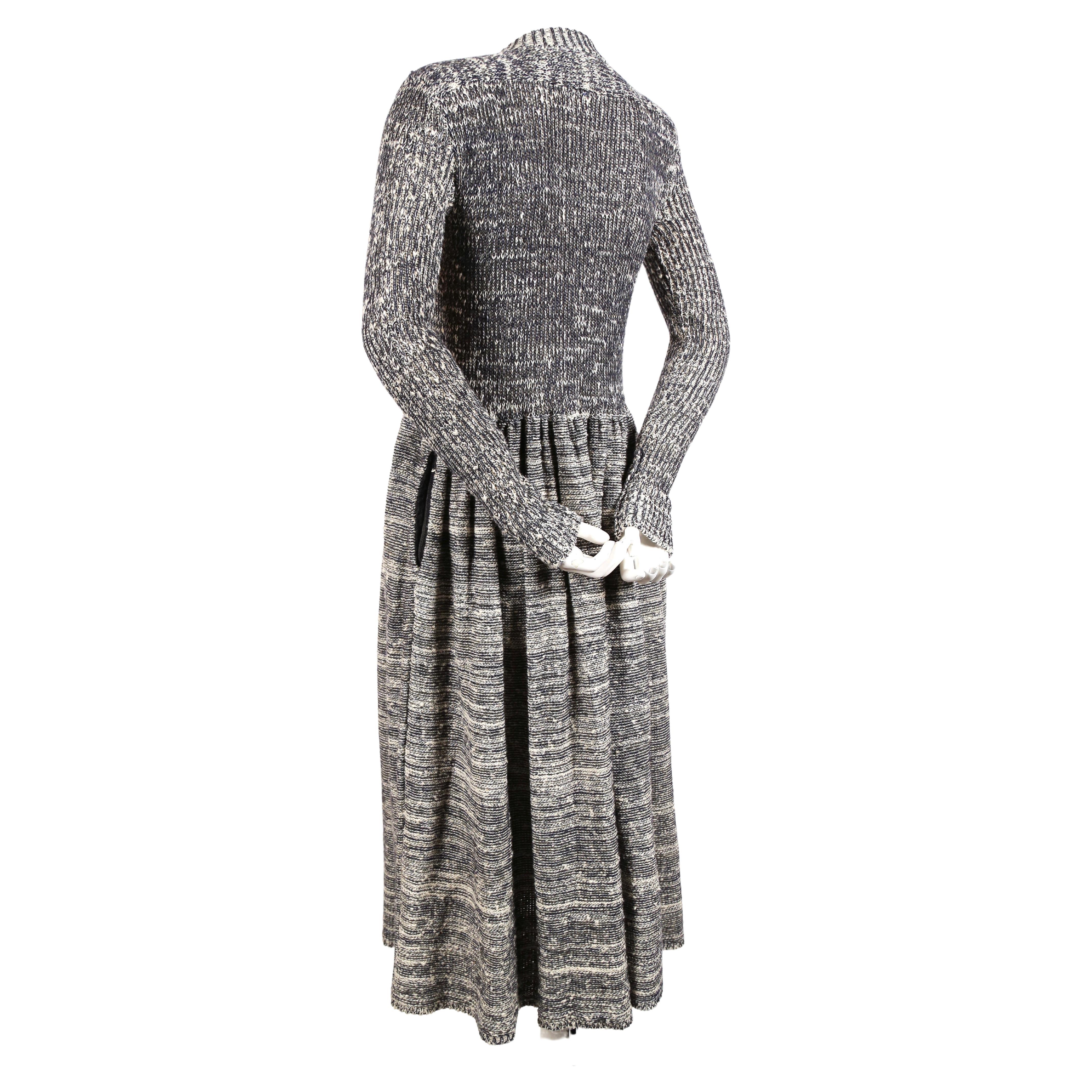 Very rare, blue-grey space dyed knit dress designed by Issey Miyake dating to fall of 1974 as documented in 'Issey Miyake: East Meets West'. Labeled a Japanese size 'M'. This would also fit US XS or S. Approximate measurements: bust (unstretched)