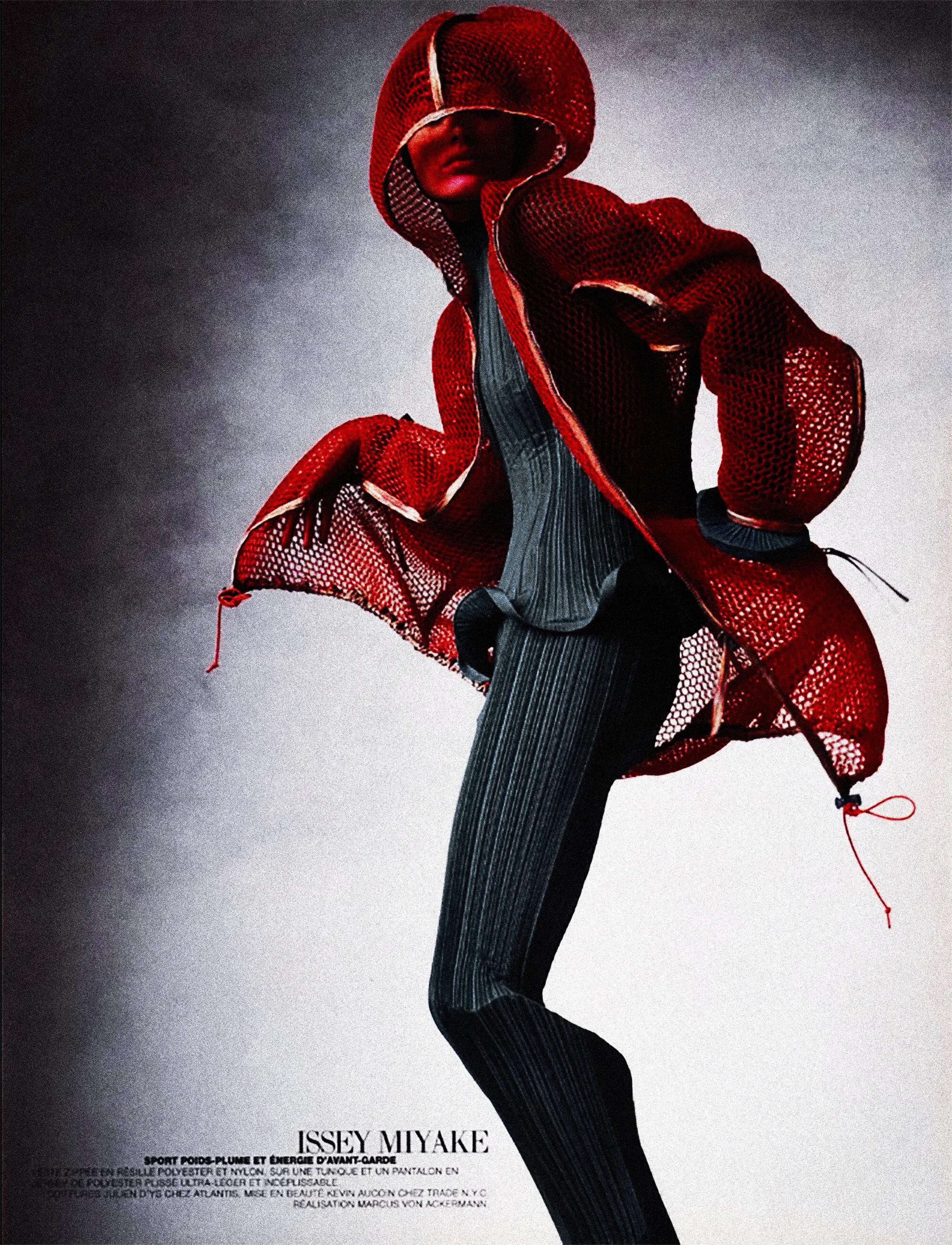 Stunning two piece PLEATS PLEASE by ISSEY MIYAKE ensemble, top and skirt. Similarly worn by Shalom Harlow, photographed by the great Irving Penn for Vogue, 1997. This striking creation, a testament to Miyake’s innovative spirit, marries the