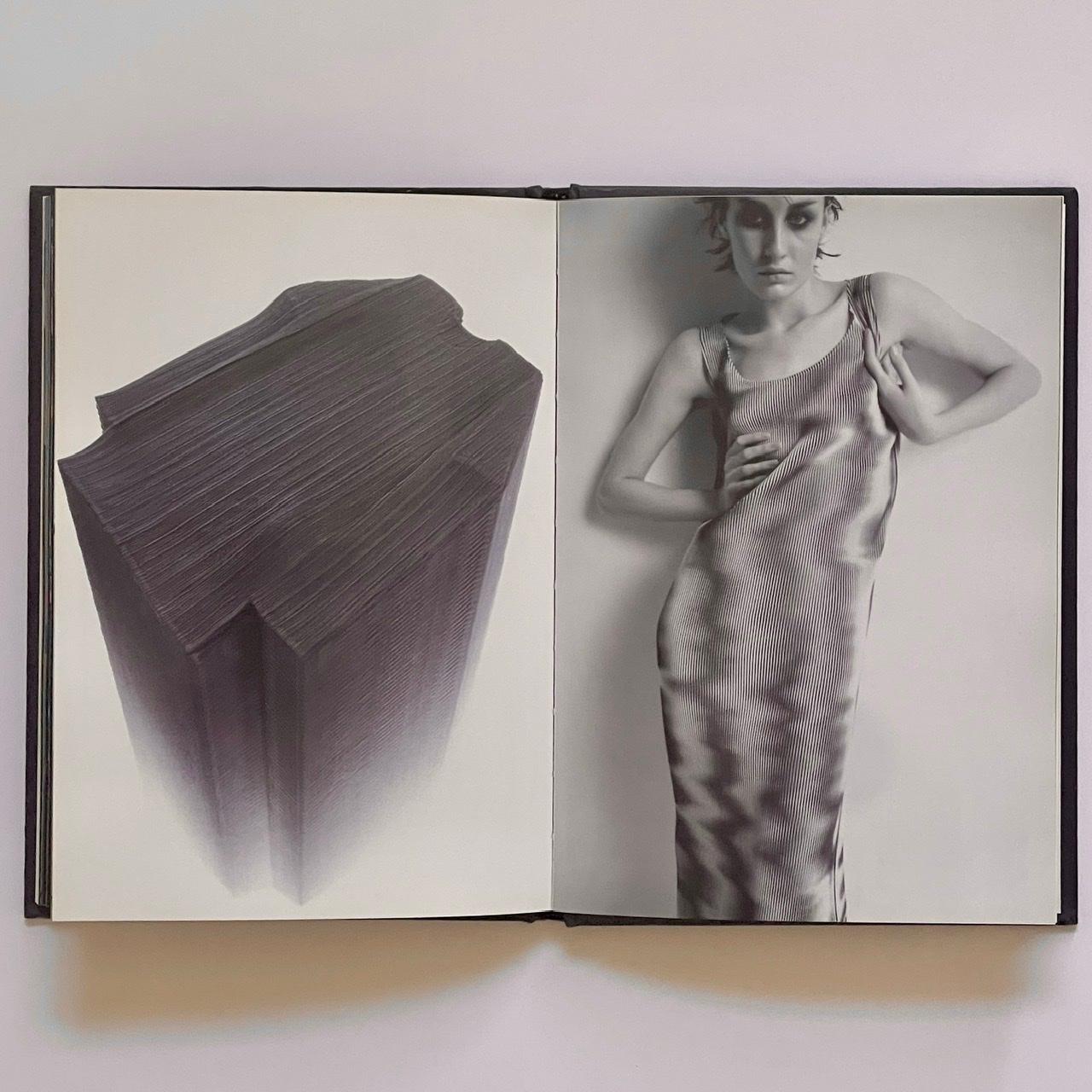 Issey Miyake 
Published by Schirmer/Mosel, first edition 1997. German text. 

A beautiful small hardback photo book surveying the work of Issey Miyake, hardback with gilt lettering to the spine and full bleed images throughout. 
Between East and