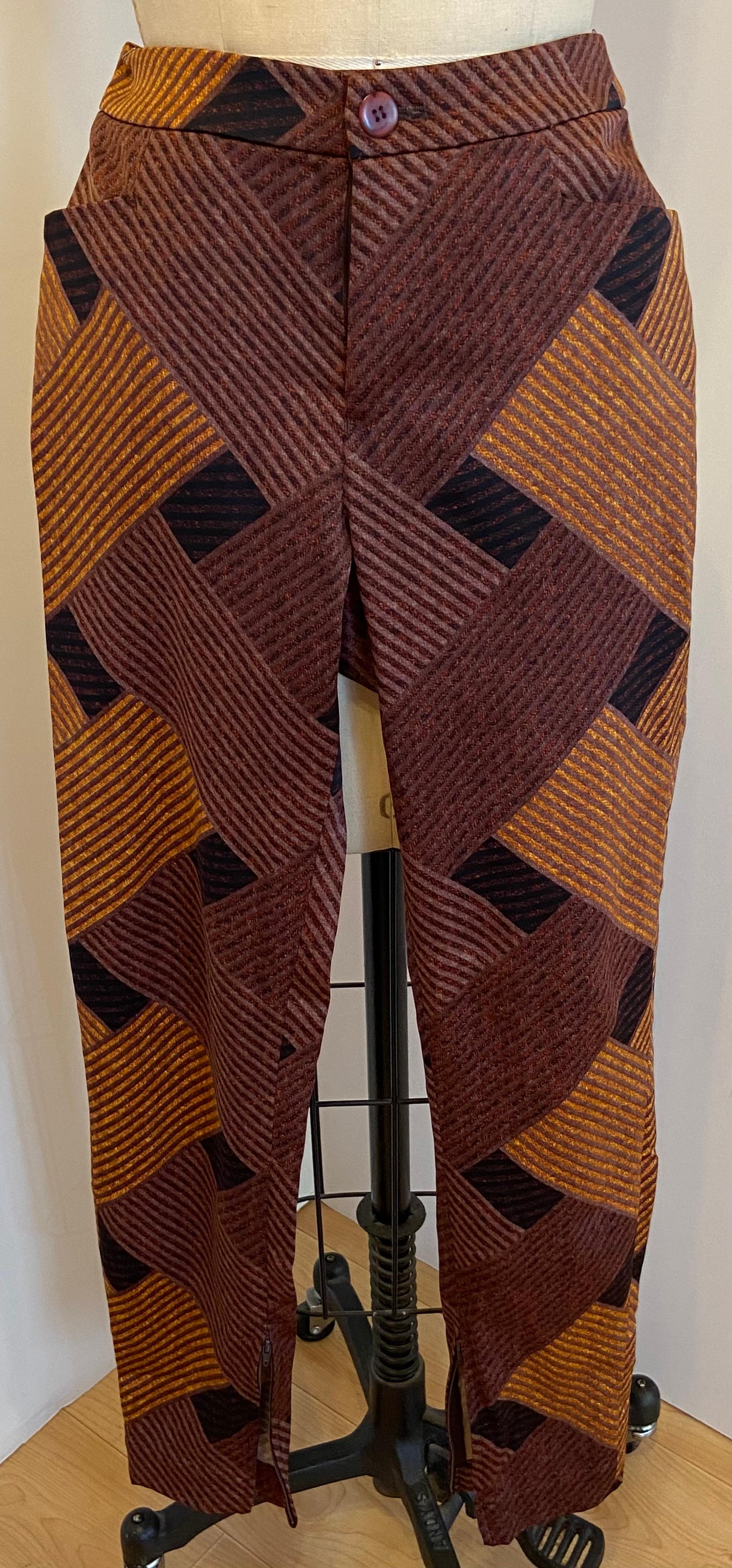    Issey Miyake wonderfully bold abstract trousers in multi golden shades of browns is size 30/Japan. There are two front 