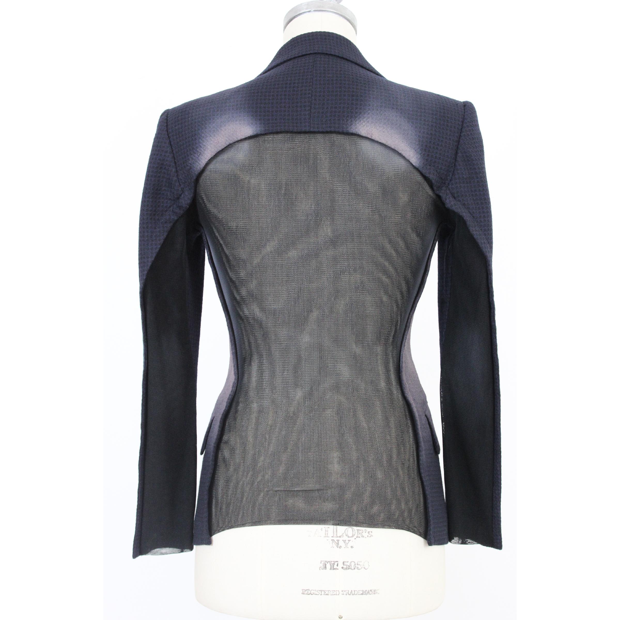 Issey Miyake vintage women's flared jacket. Dark gray with some shades of beige. Back in transparent material. Double breasted, 100% wool. 2000s. Made in Japan. Excellent vintage condition. 

Size: 40 It 6 Us 8 Uk 2 Jp 

Shoulder: 40 cm 
Bust/Chest: